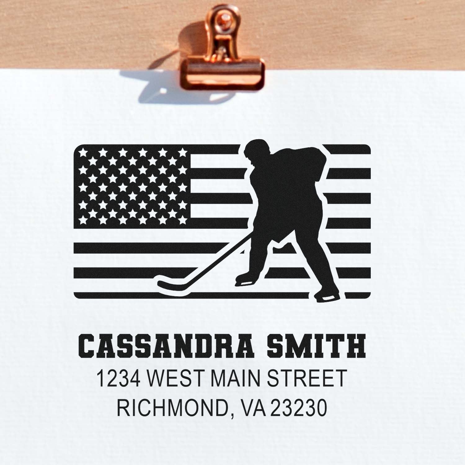 Personalized hockey rubber stamp with American flag, custom return address for Cassandra Smith, Richmond VA 23230.
