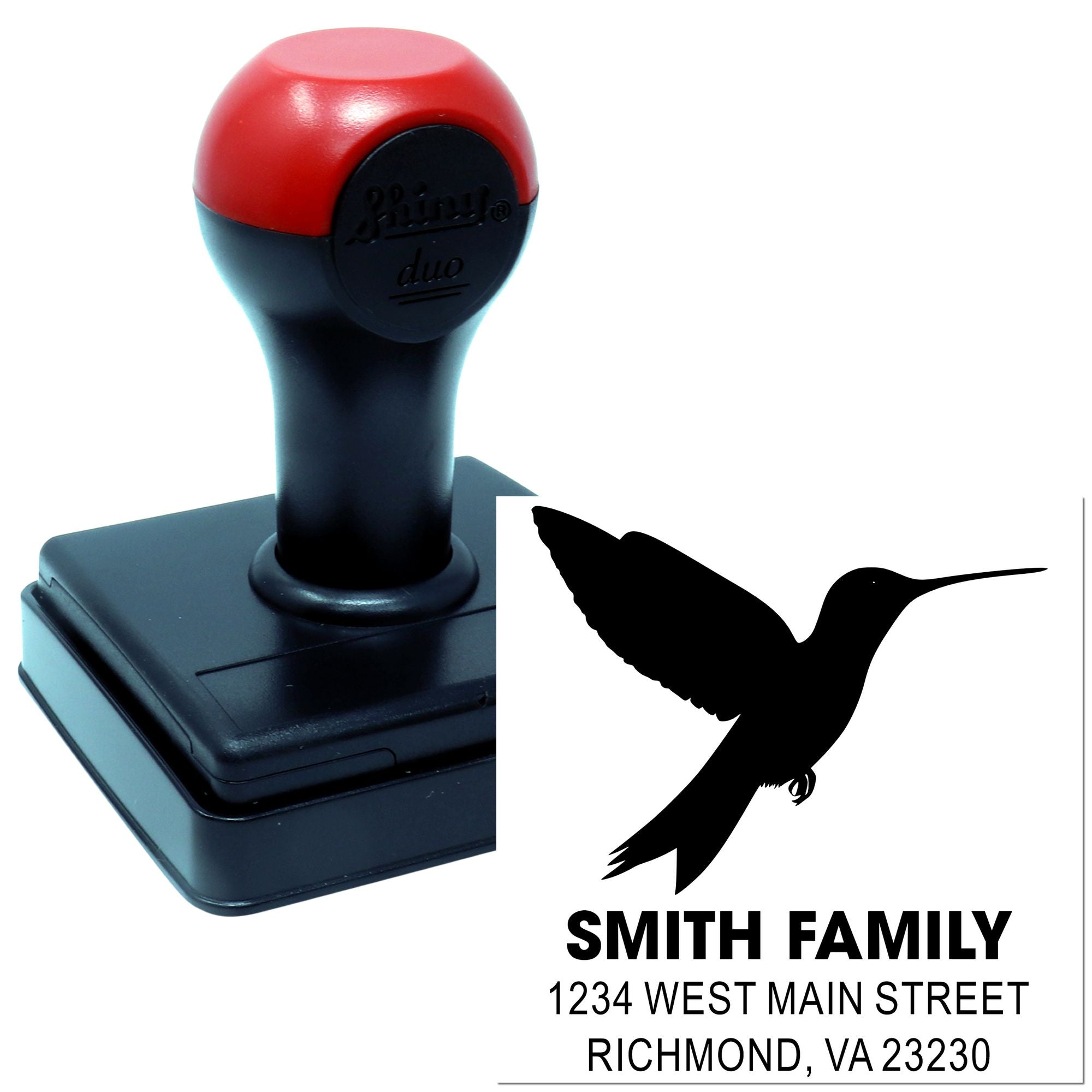 Custom self-inking rubber address stamp with hummingbird logo and Smith family return address imprint
