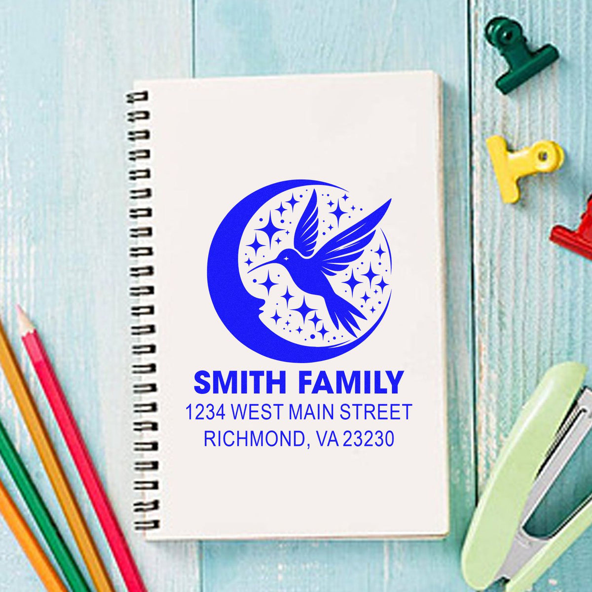 Custom return address rubber stamp design with hummingbird moon logo for Smith Family.