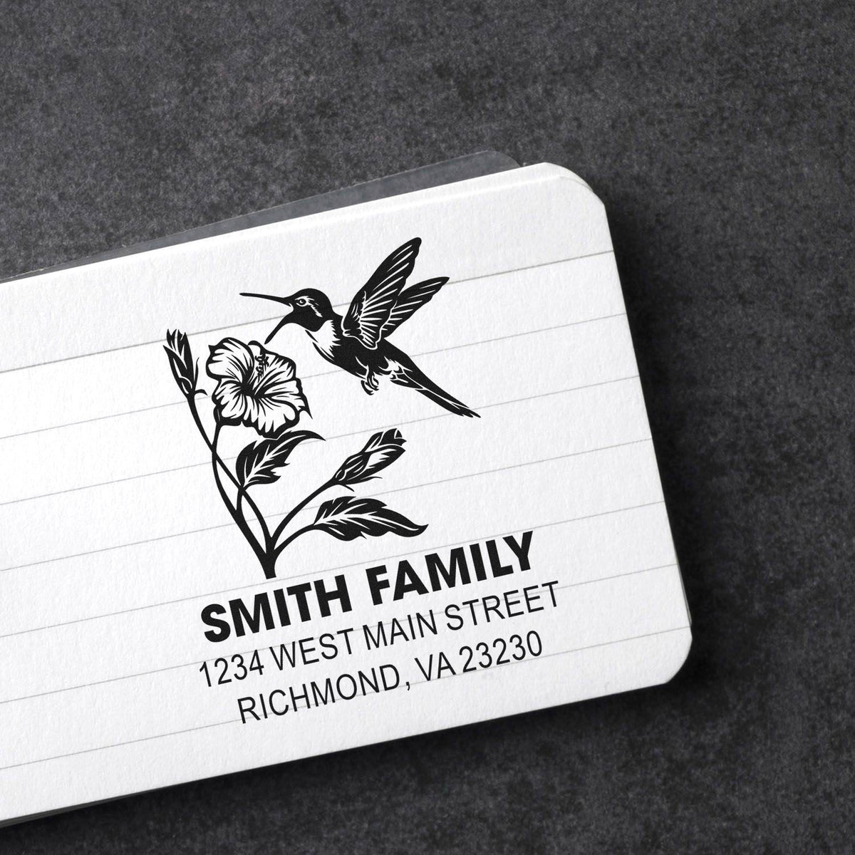 Custom family address rubber stamp with hummingbird and hibiscus floral design, featuring Smith Family and Richmond, VA address.