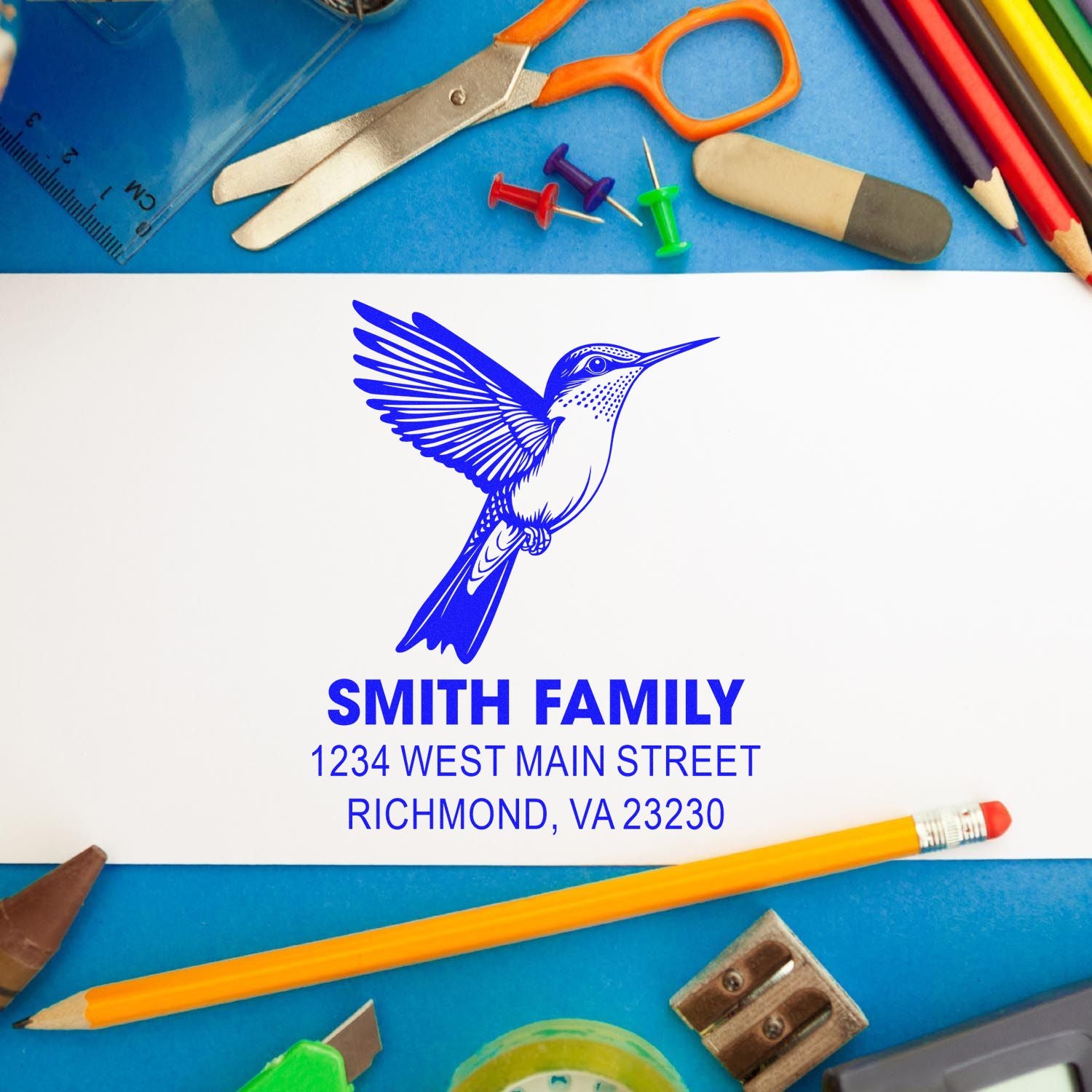 Custom return address rubber stamp with hummingbird logo for Smith Family, Richmond, VA 23230.