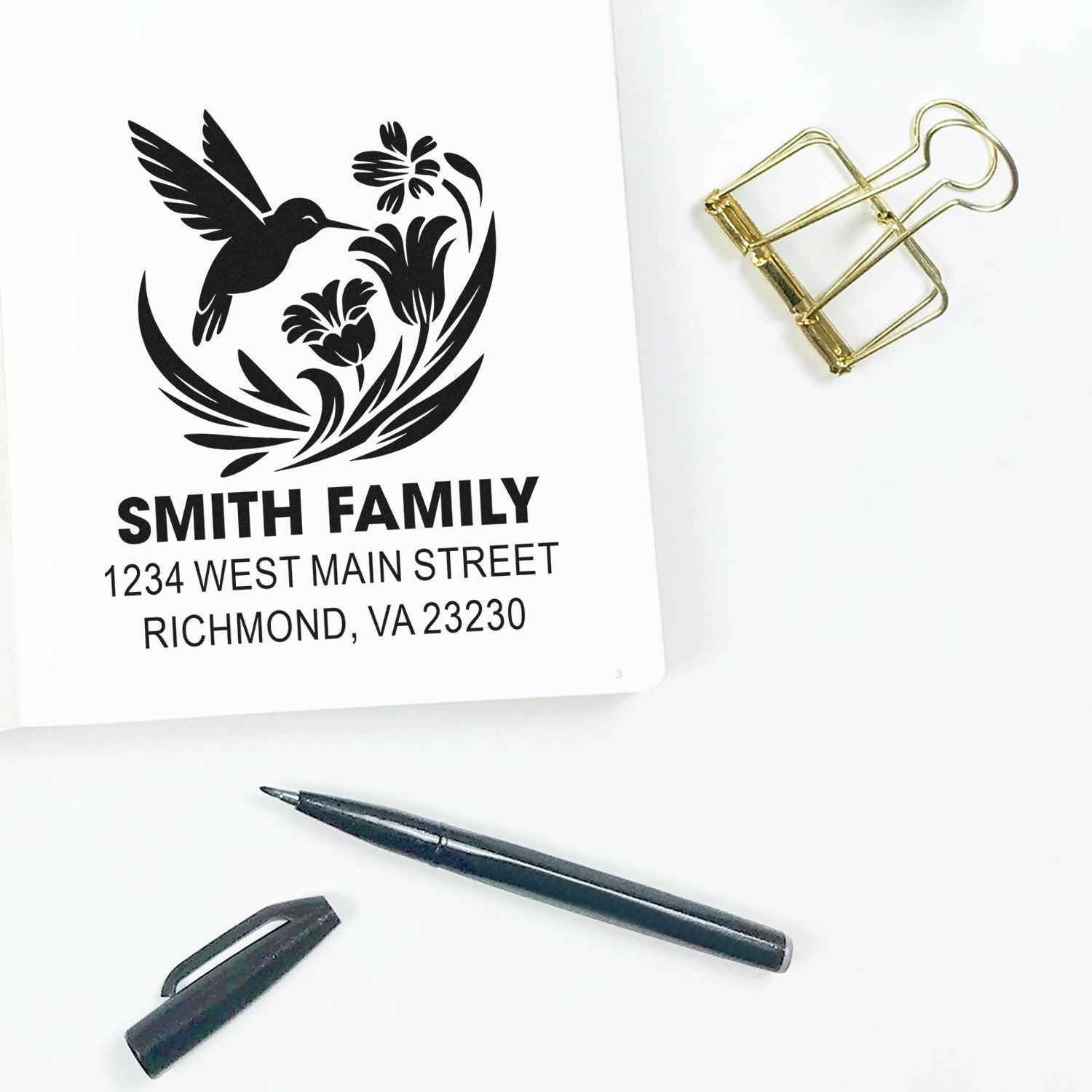 Custom return address rubber stamp with hummingbird floral design for Smith family home mailings.
