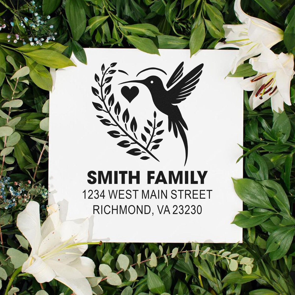 Custom hummingbird return address rubber stamp for Smith Family with floral wreath and Richmond, VA address.