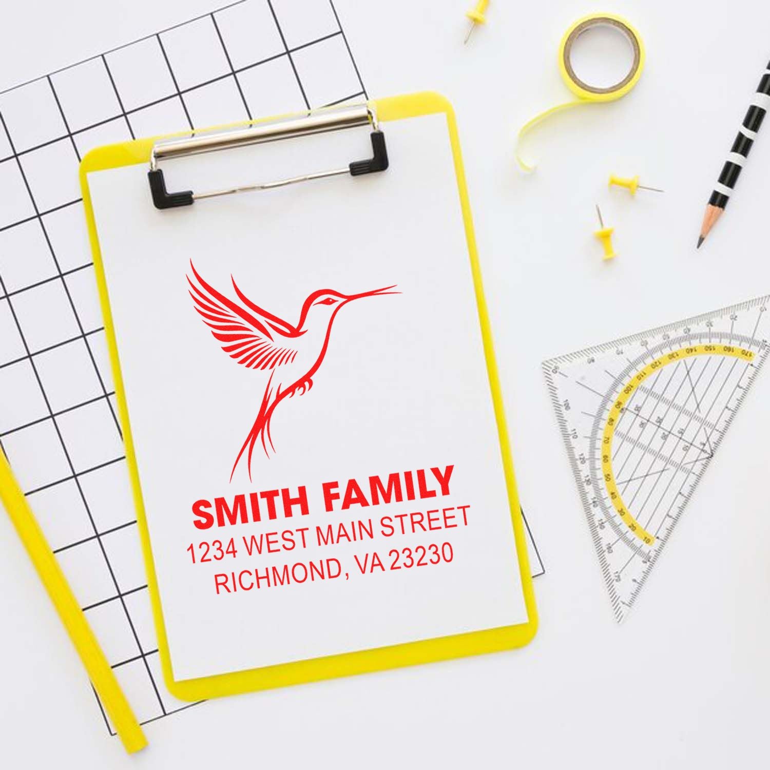 Custom rubber return address stamp with hummingbird logo for Smith Family, featuring name and Richmond, VA address.