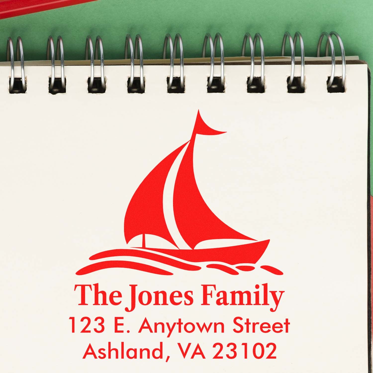 Custom rubber stamp return address design with sailboat logo for The Jones Family, Ashland, VA.