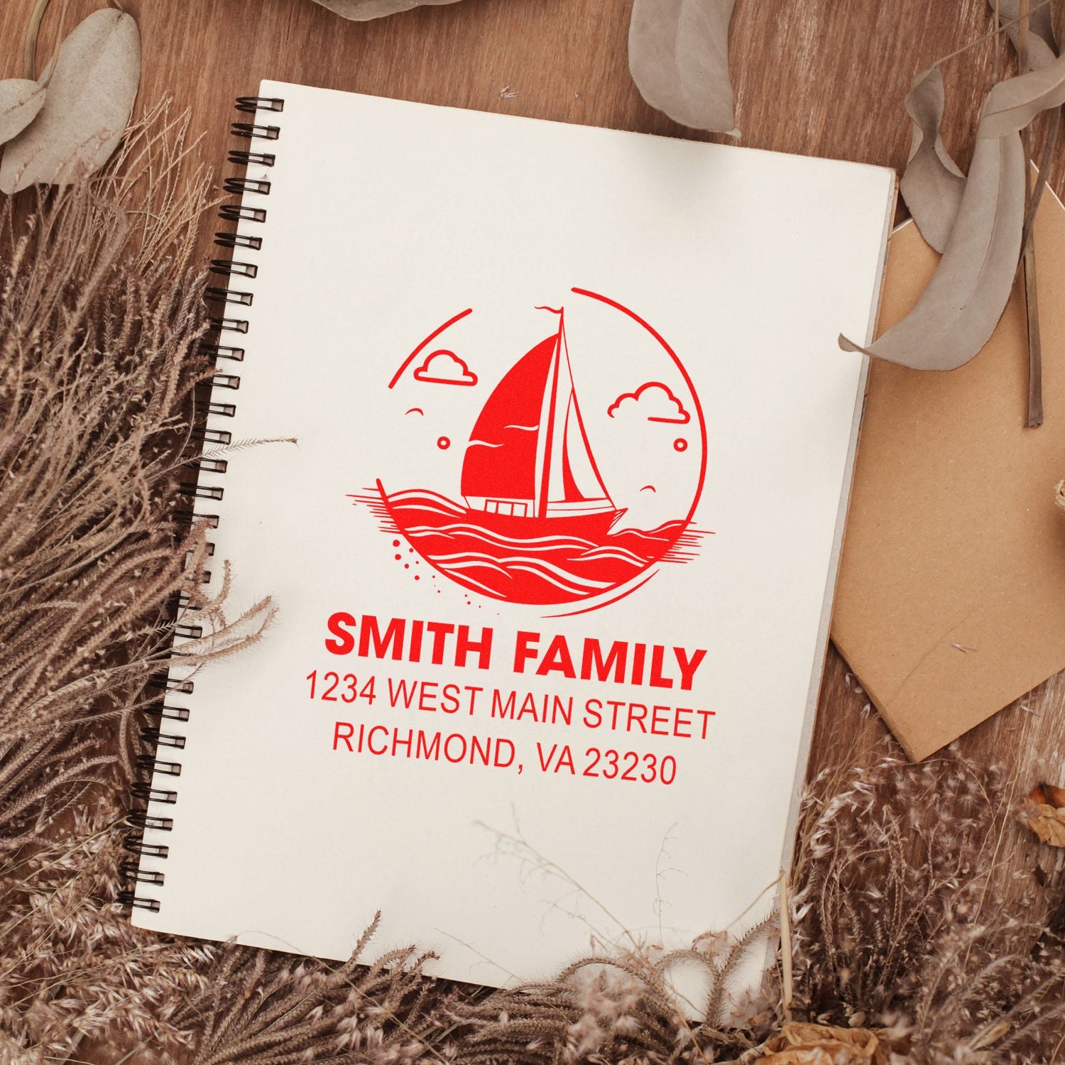 Custom family address rubber stamp with sailboat design for Smith Family, 1234 West Main Street, Richmond, VA 23230.