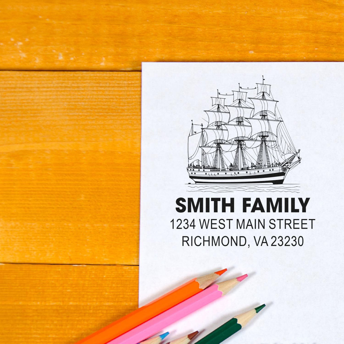 Custom nautical return address rubber stamp with tall ship design, family name, and personalized address.