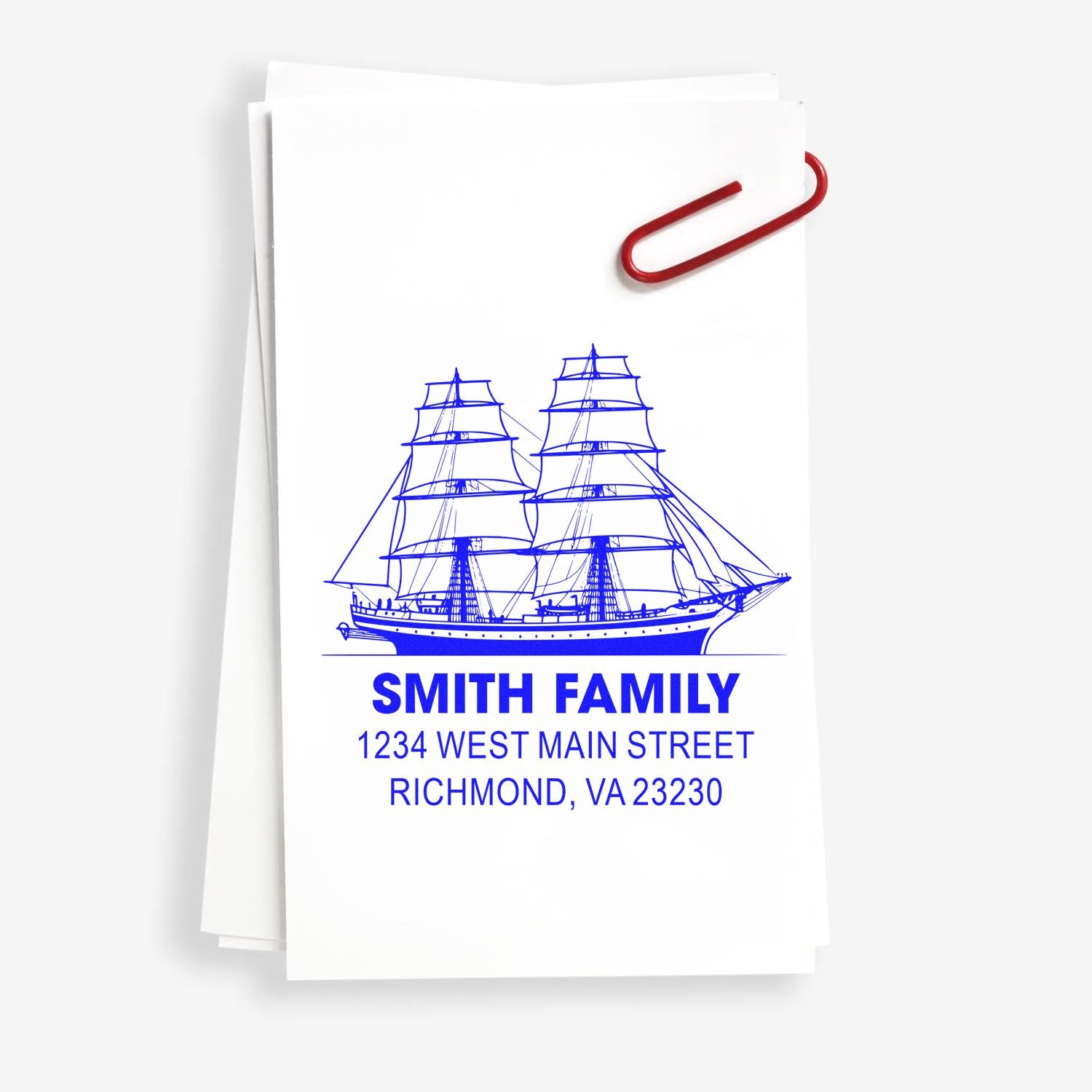 Custom nautical return address rubber stamp with ship design, Smith Family name, and Richmond, VA address on paper.