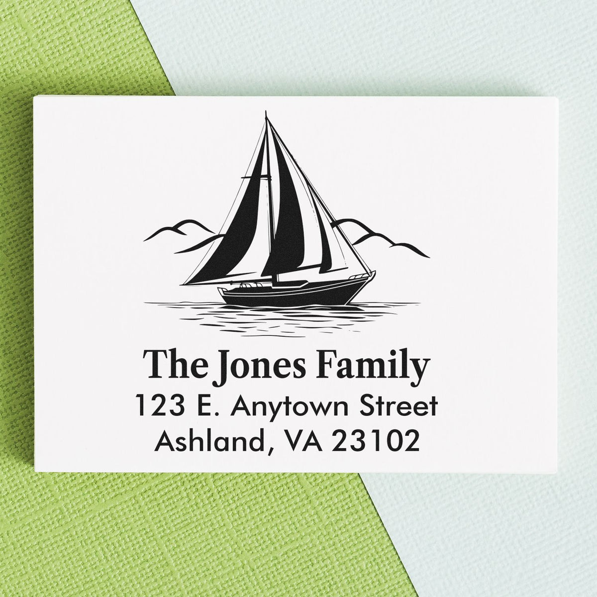 Custom sailboat return address rubber stamp for The Jones Family, Ashland, VA mailing address.