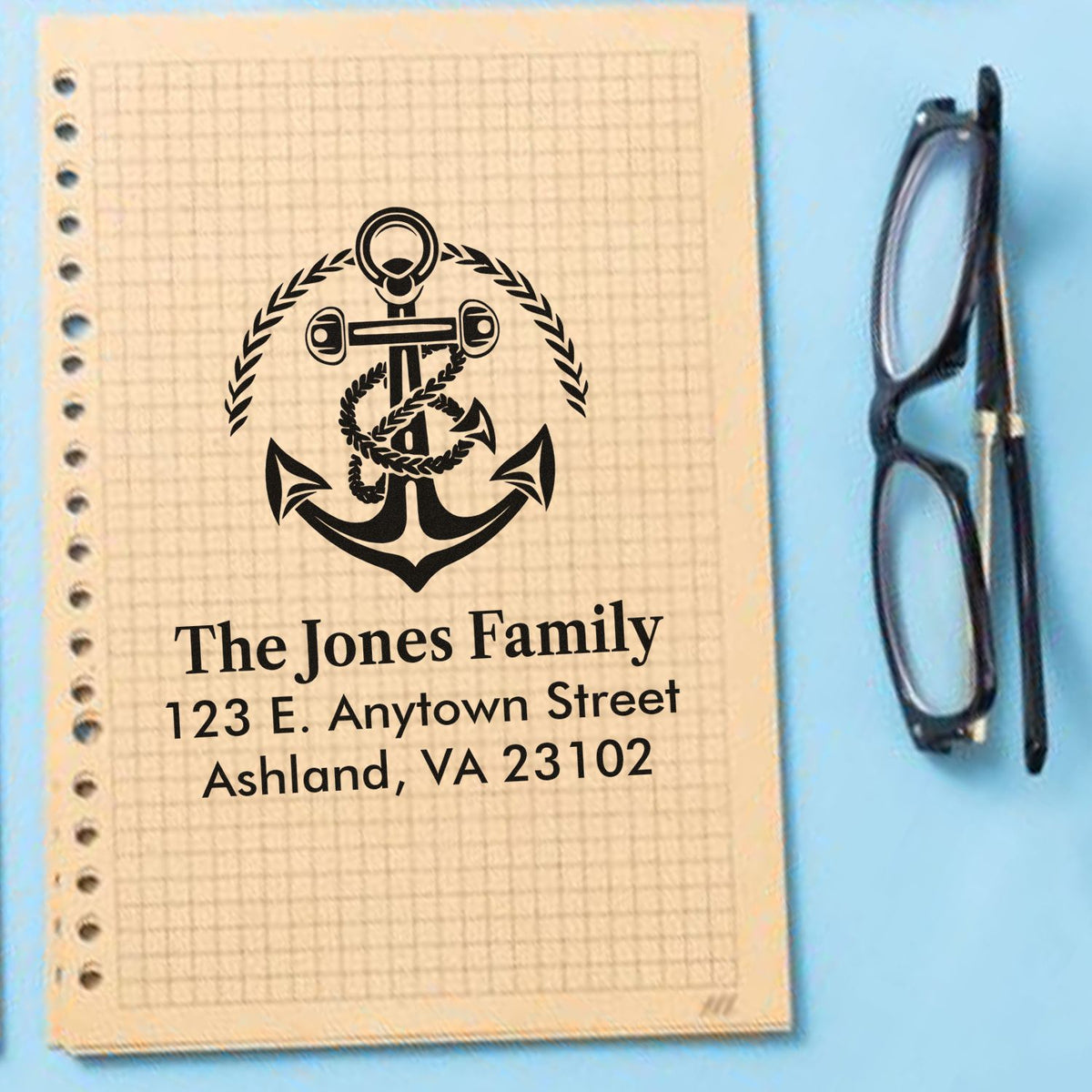 Personalized family address rubber stamp with anchor monogram for The Jones Family, ideal for nautical stationery.