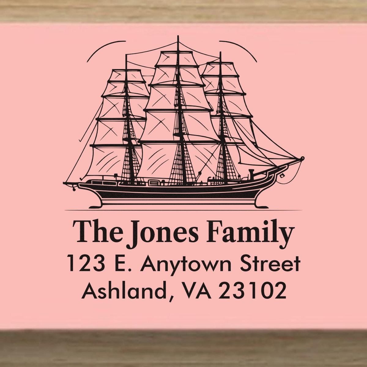 Personalized rubber stamp with tall ship design, family name, and return address for The Jones Family in Ashland, VA.