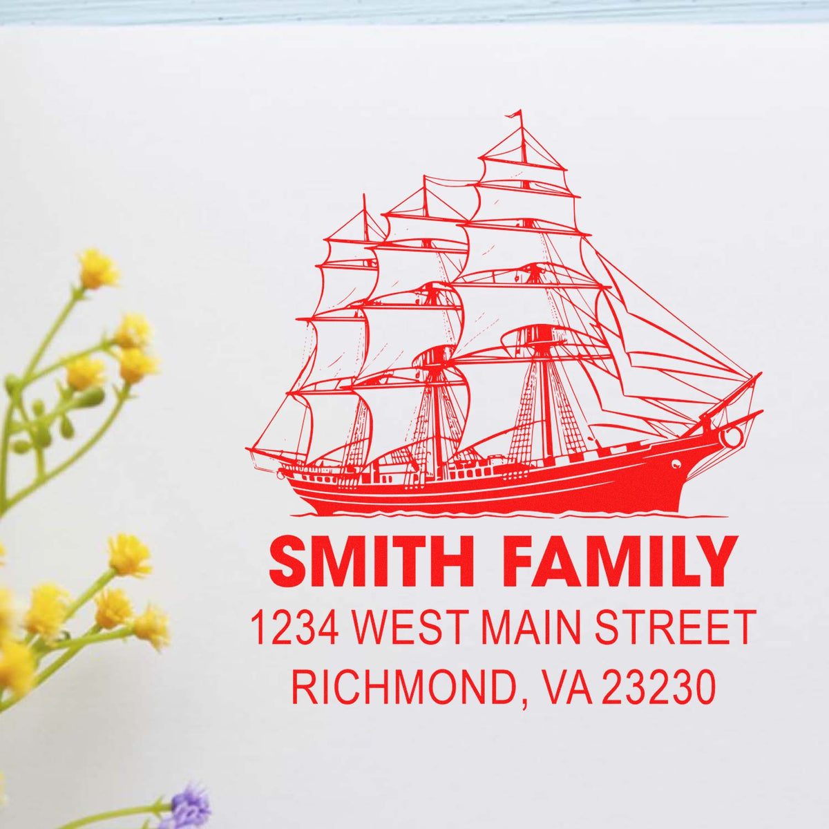Custom return address rubber stamp with red sailing ship logo, Smith Family, 1234 West Main Street, Richmond, VA 23230.
