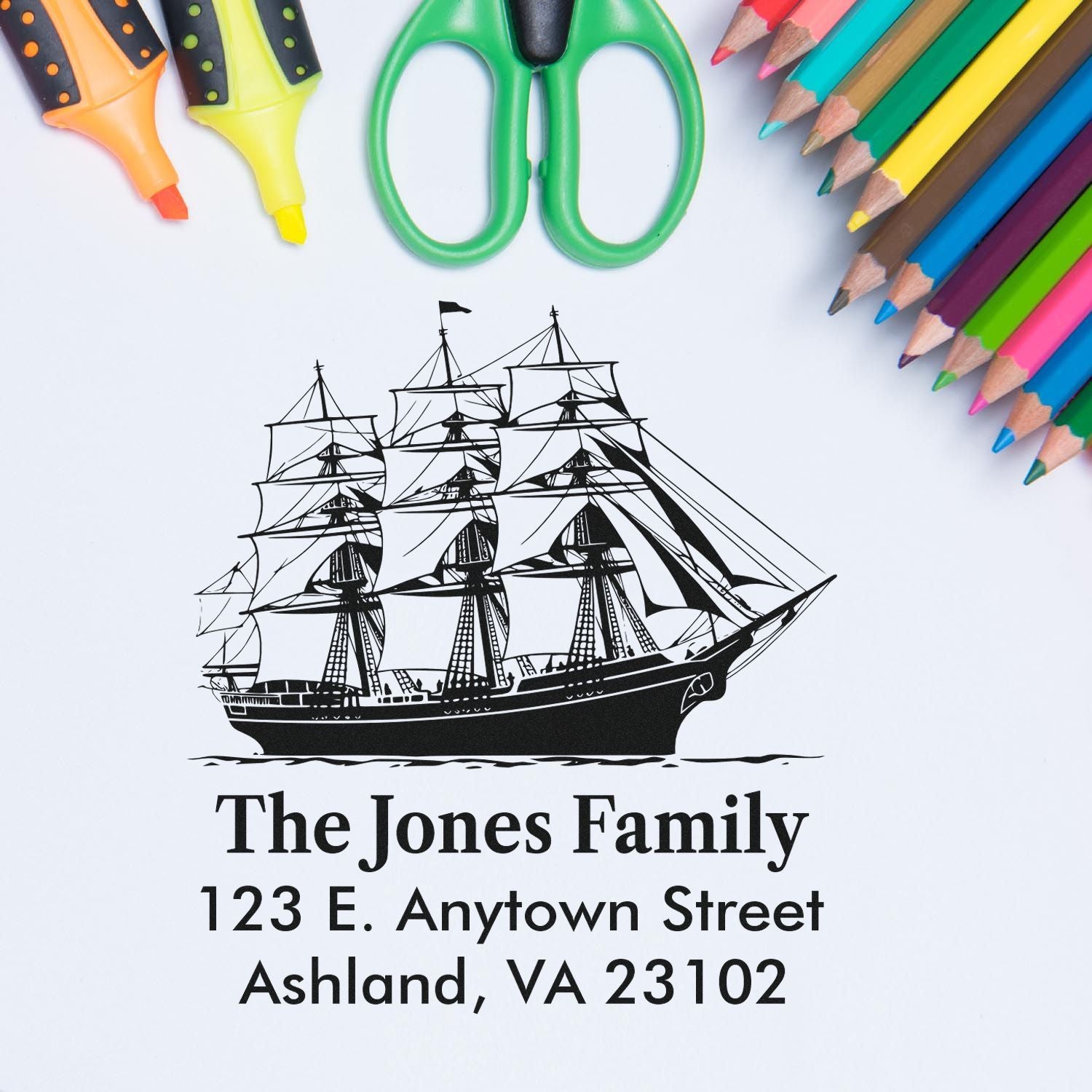 Custom rubber return address stamp with sailing ship design, family name, and address for personalized envelopes.