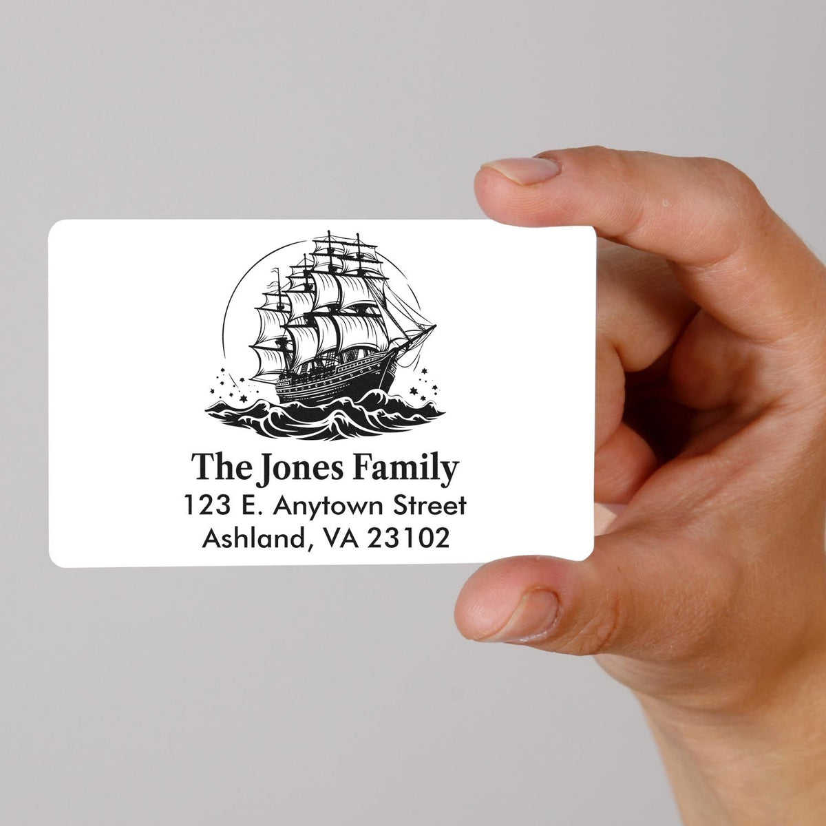 Custom family return address rubber stamp with sailing ship design, featuring The Jones Family and Ashland, VA address.