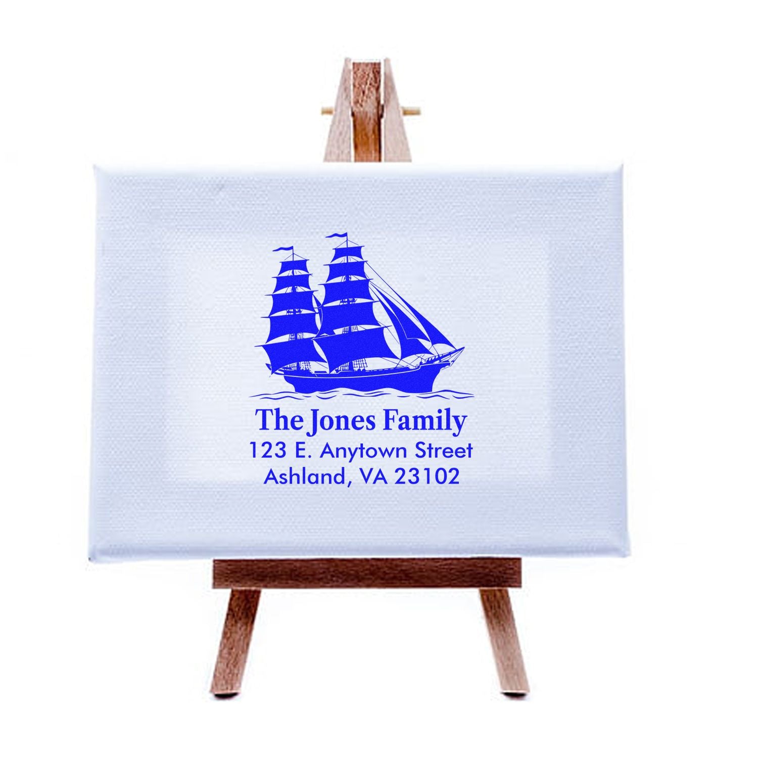 Custom sailboat return address rubber stamp with family name and address, perfect for personalized stationery and envelopes.