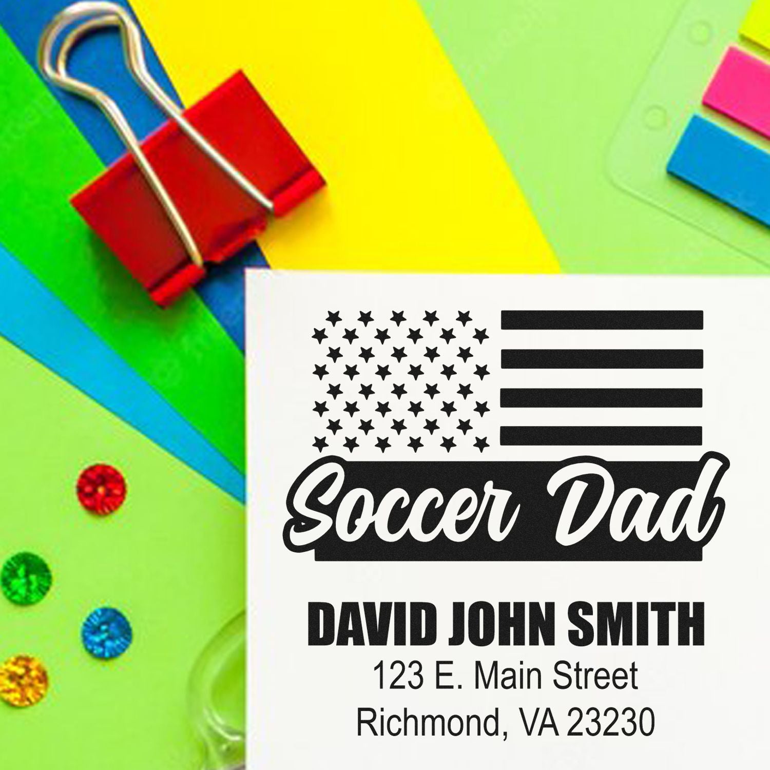 Custom rubber stamp for Soccer Dad with name and address, featuring an American flag design for personalized mailing and crafts.