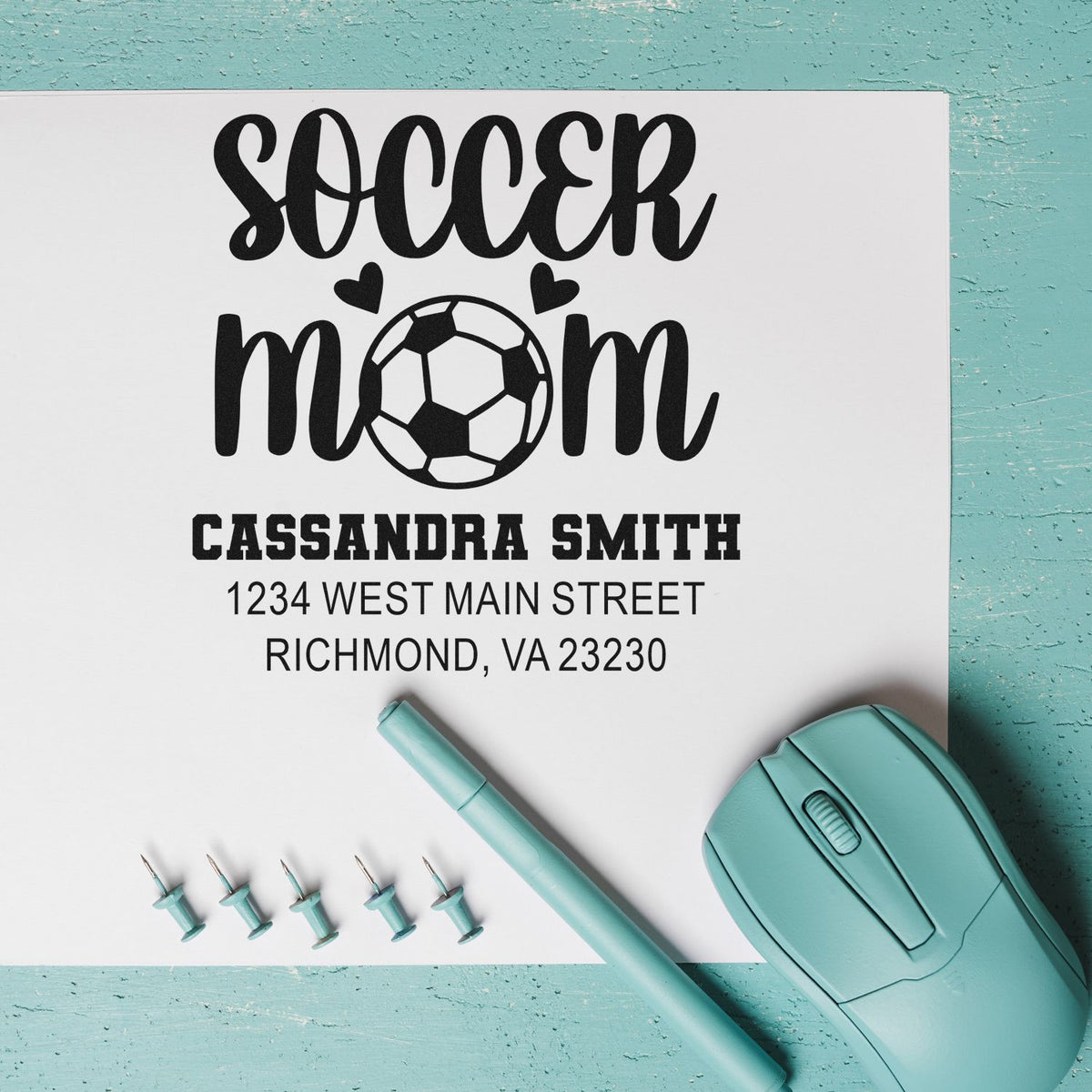 Custom self-inking soccer mom rubber stamp with name and address, perfect for personalized mailing and sports-themed gifts.