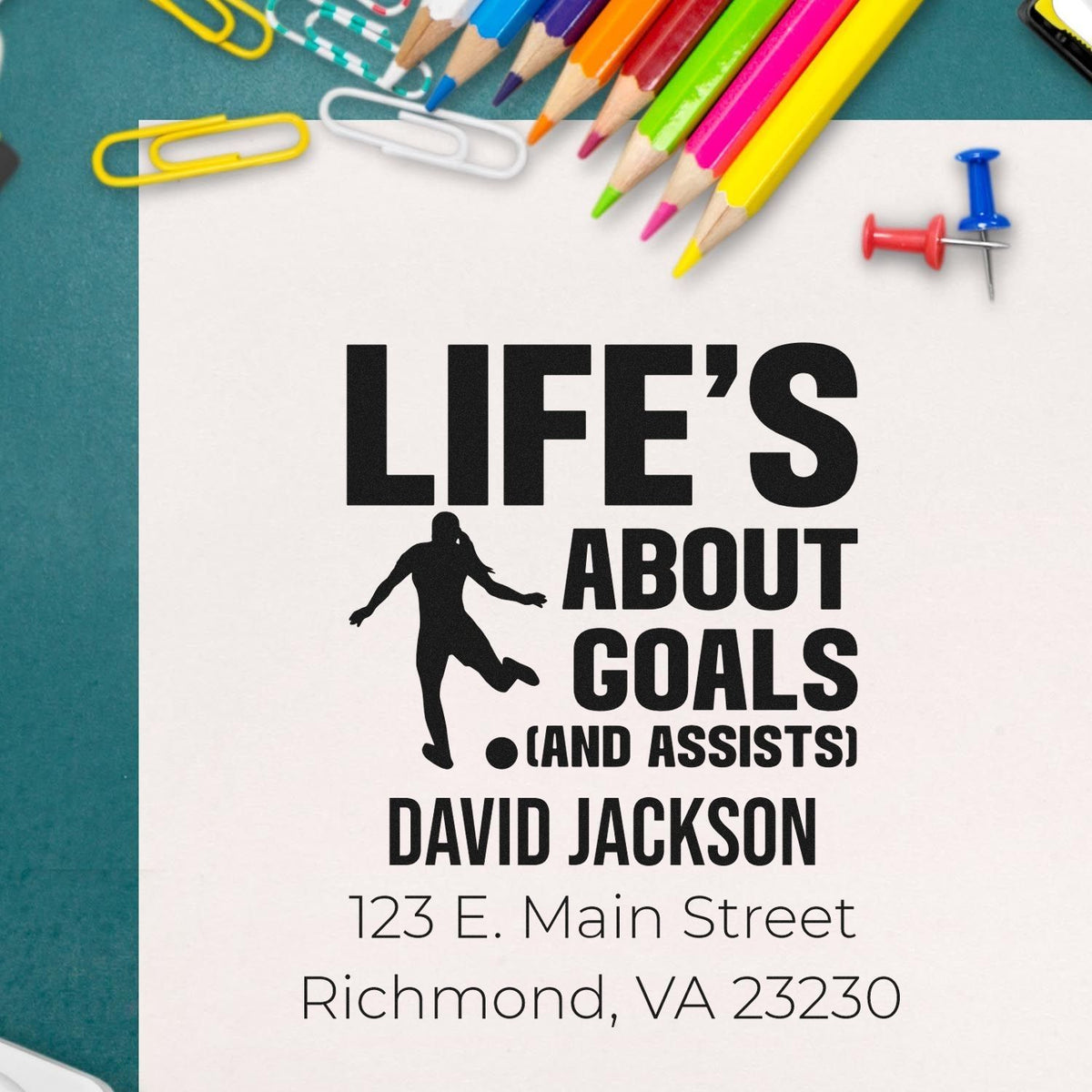 Personalized rubber stamp for coach David Jackson with Lifes about goals and assists slogan and return address.