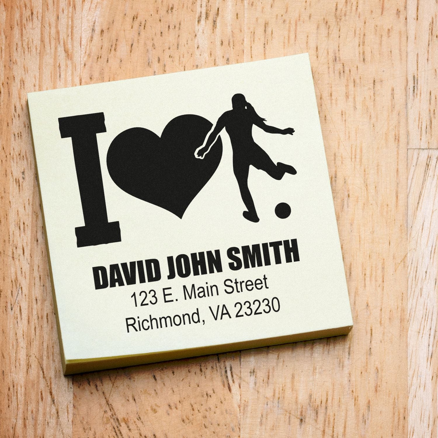 Personalized address rubber stamp with I love soccer design for David John Smith, featuring name and return address.