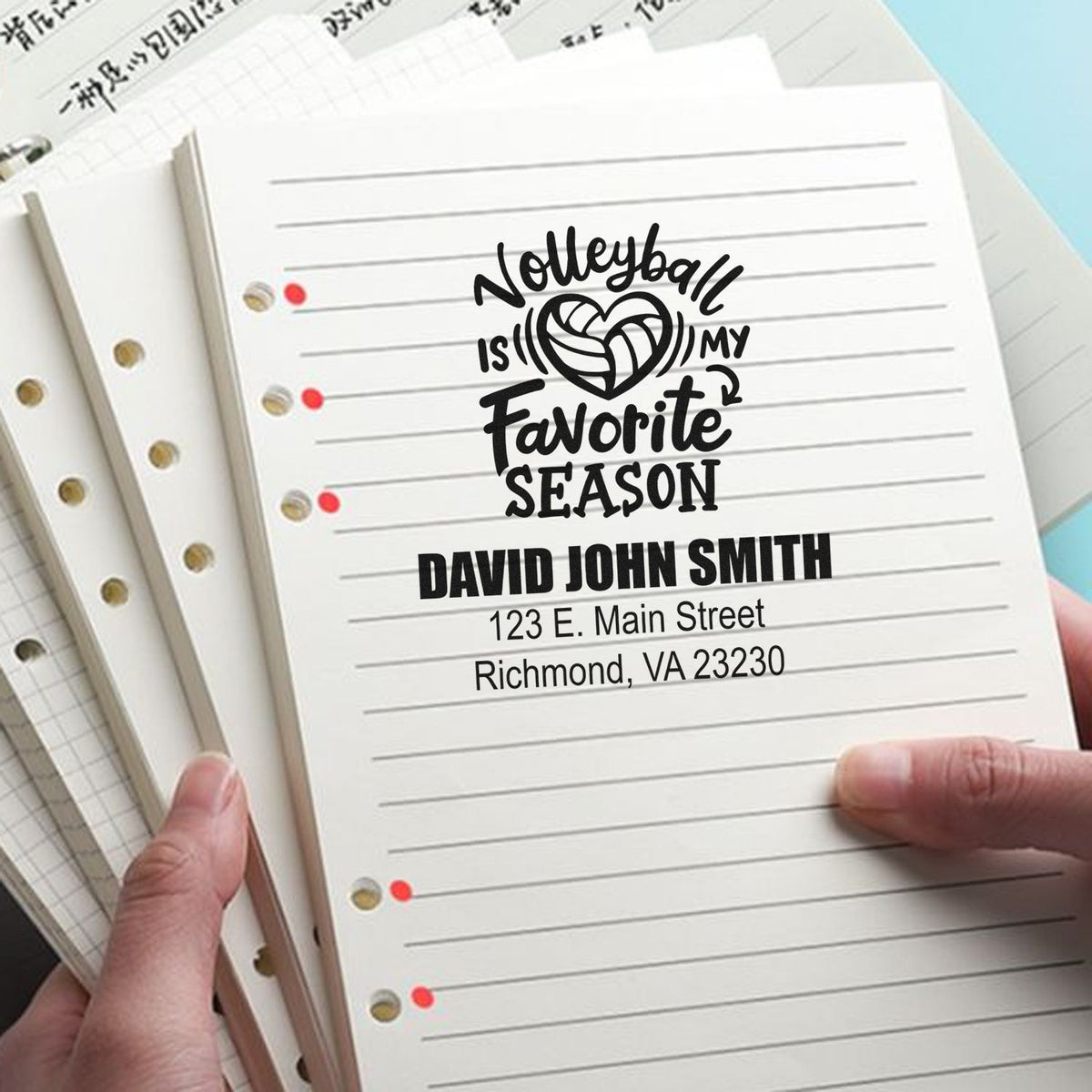 Custom volleyball rubber stamp with name and address for personalized notebooks, stationery, and school supplies.