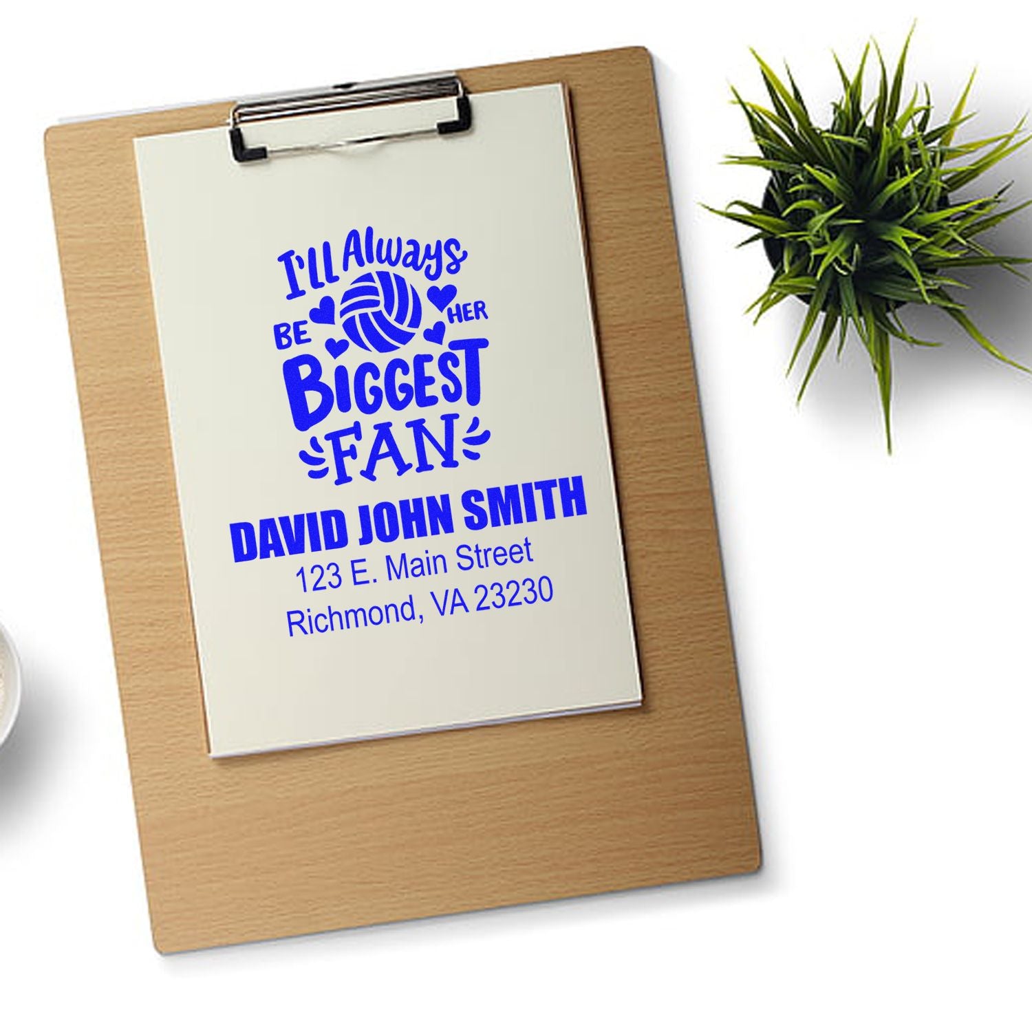 Personalized rubber stamp mockup with volleyball fan message, name, and address for custom stationery