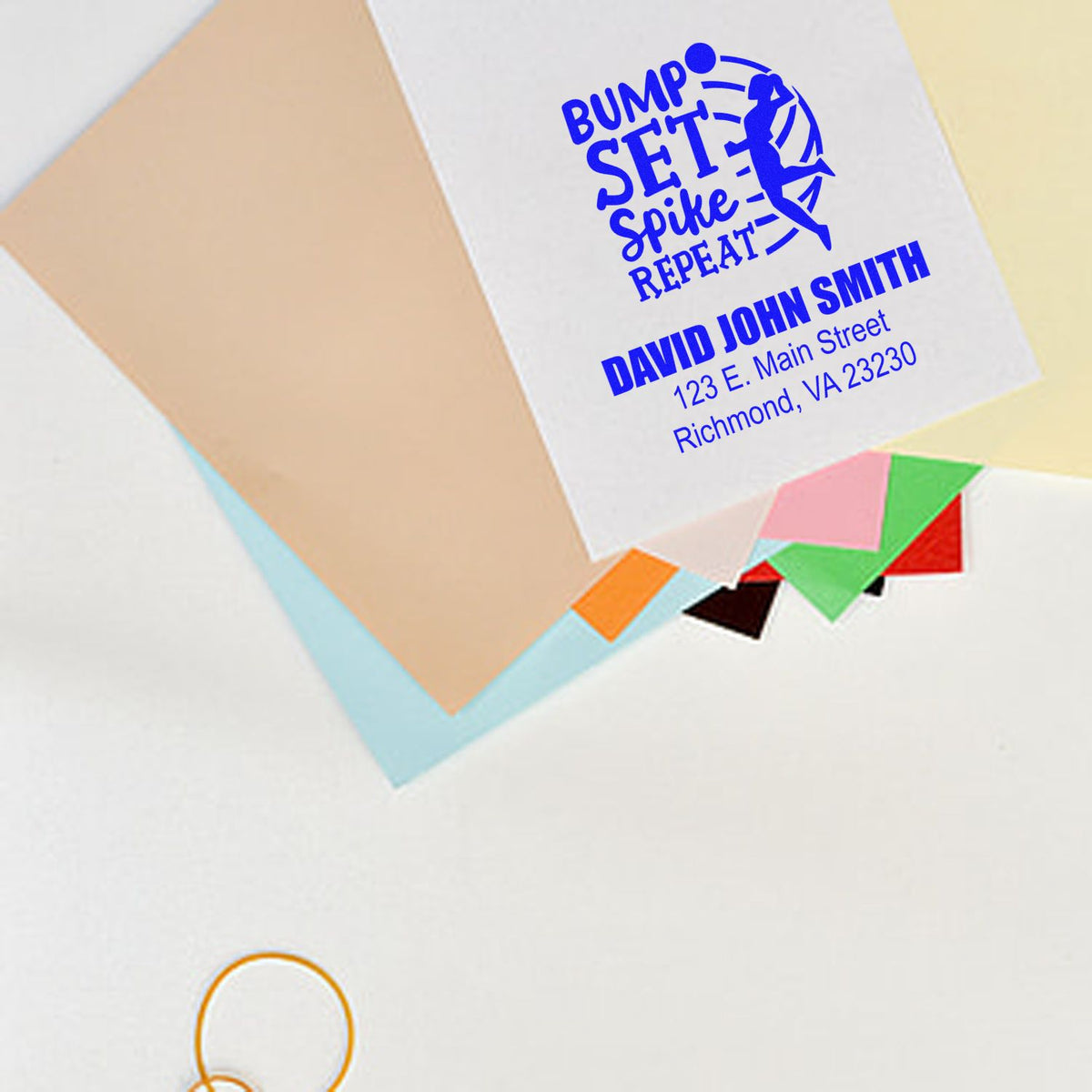 Custom rubber stamp imprint on stationery with volleyball Bump Set Spike Repeat design and return address.