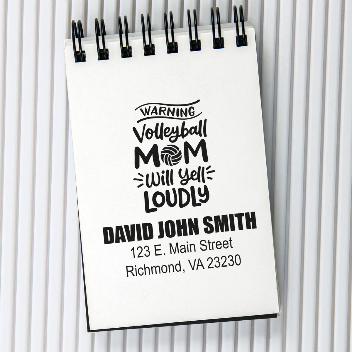 Personalized volleyball mom rubber stamp design with warning slogan, name, and address for custom stationery and mailing.