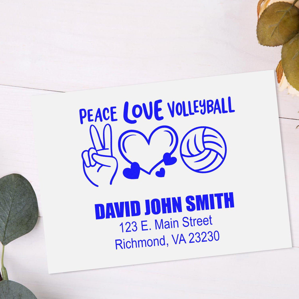 Custom volleyball rubber stamp with peace sign, heart, and personalized name and address for sports-themed stationery.