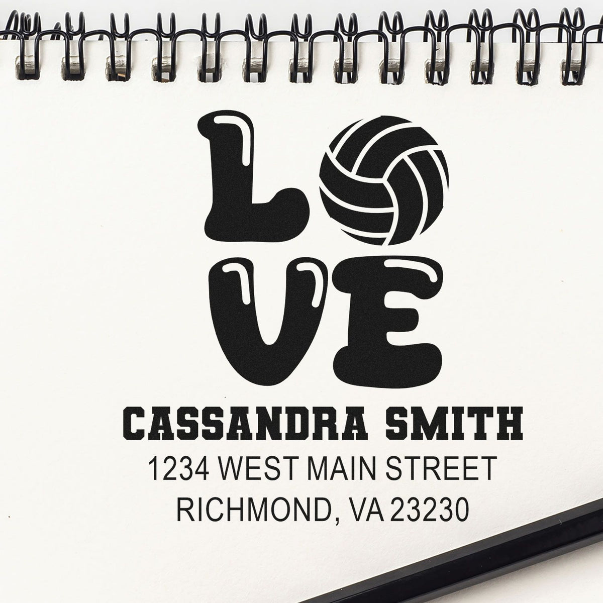 Custom rubber stamp with LOVE volleyball logo and return address for Cassandra Smith, Richmond, VA.