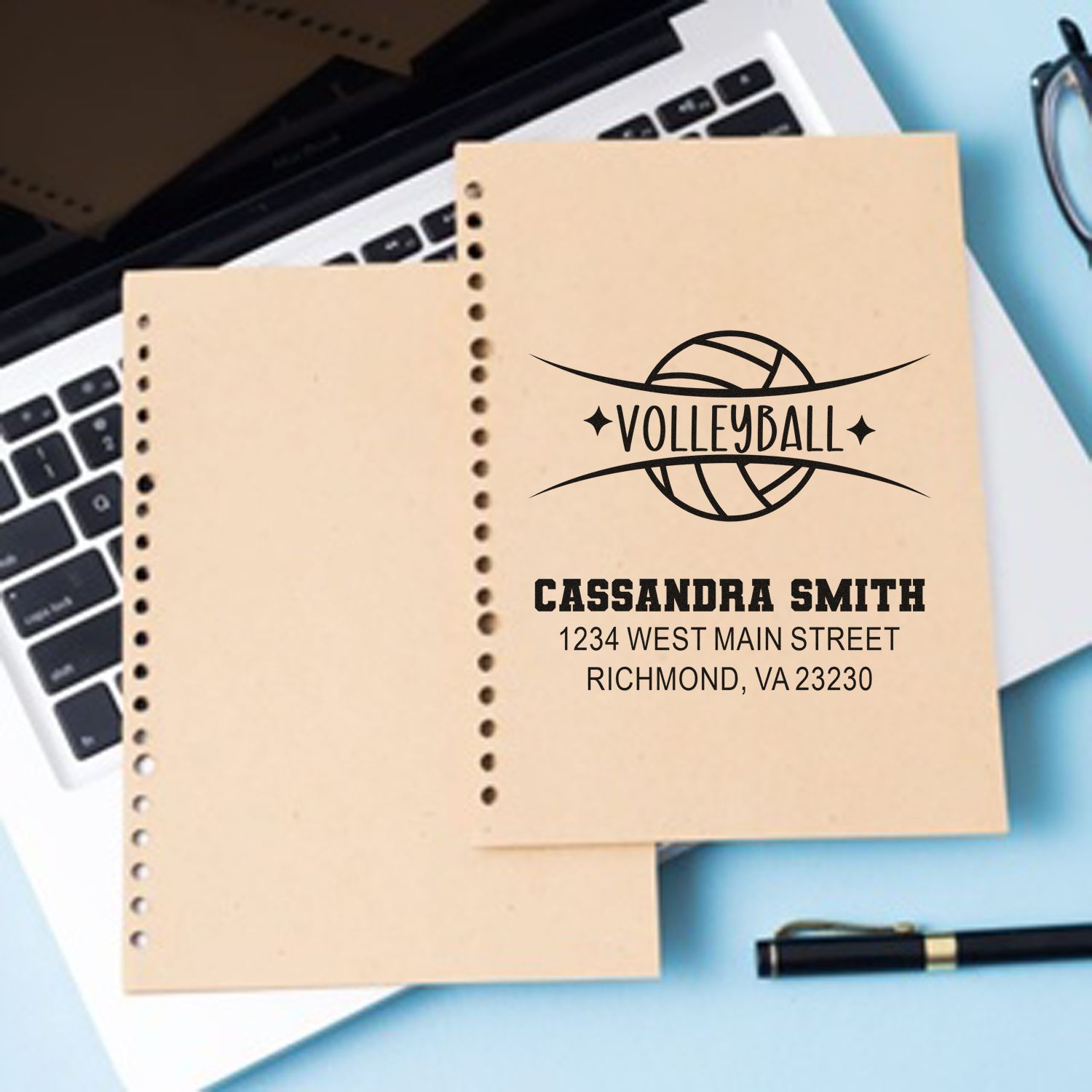 Custom volleyball rubber stamp with personalized name and address on notebooks, a sports-themed return address stamp.