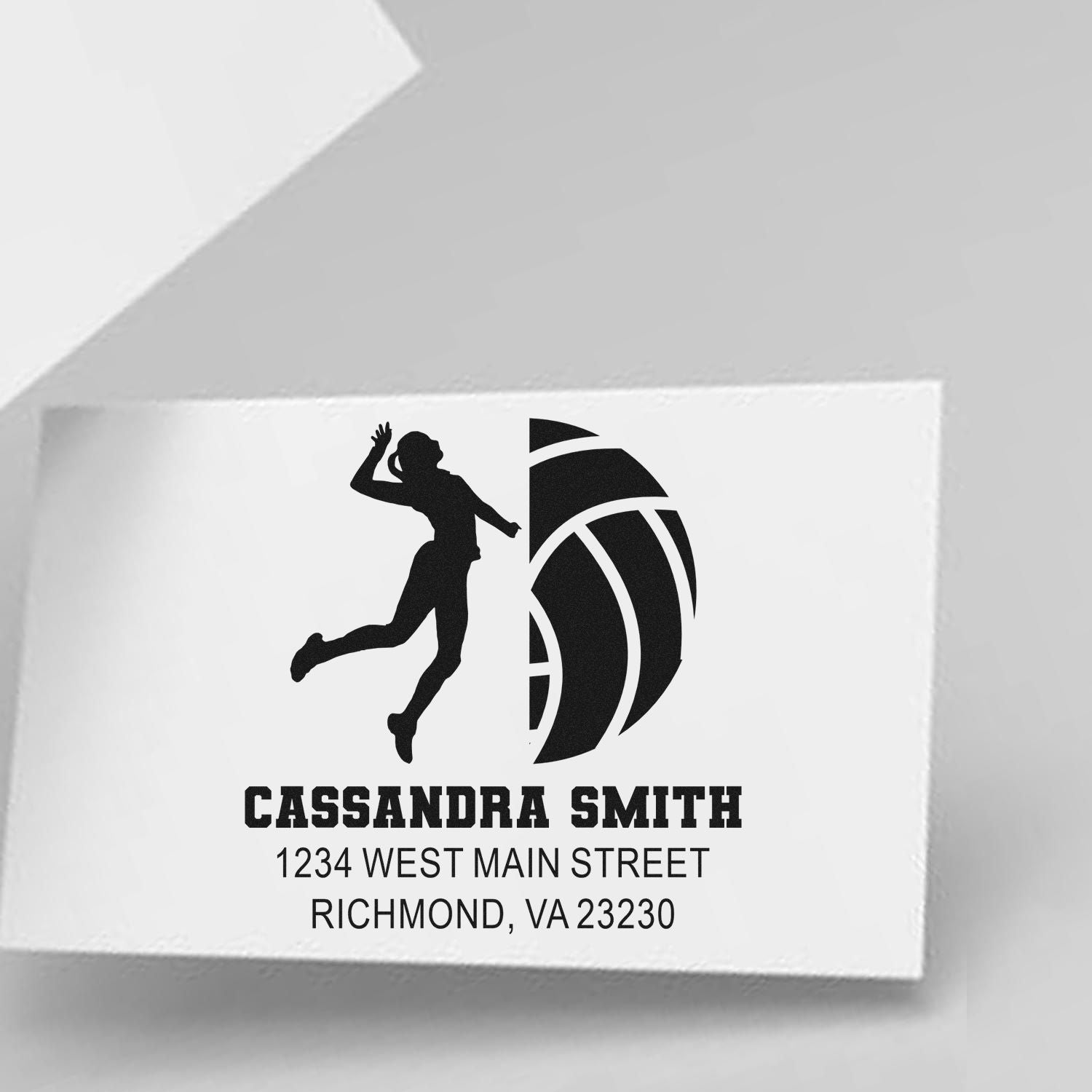 Personalized volleyball rubber stamp with player silhouette, Cassandra Smith name, and address.