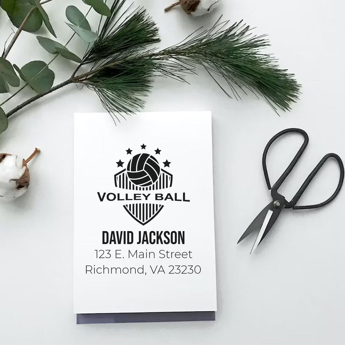 Personalized volleyball rubber stamp design with name and address for custom return address stationery.