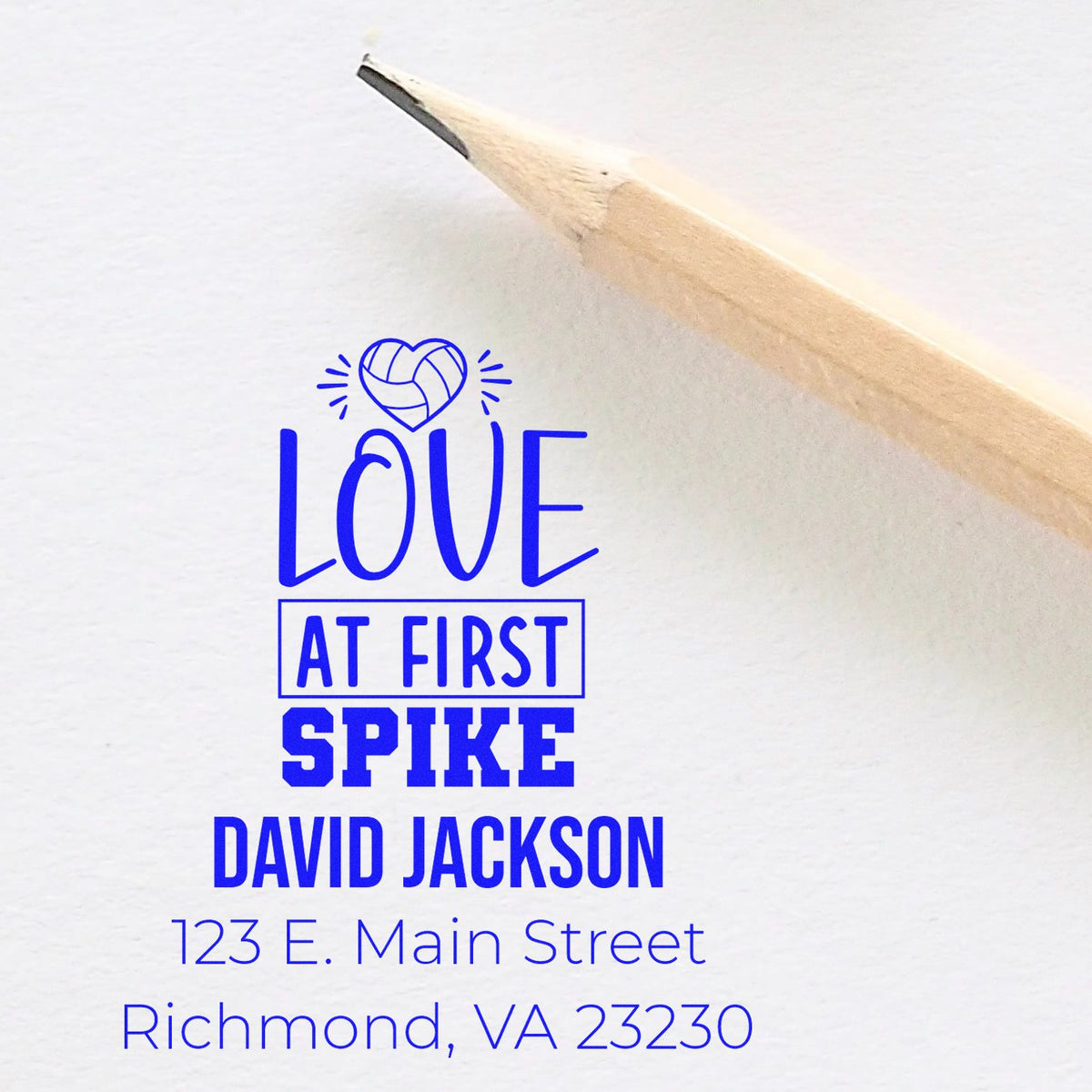 Personalized rubber stamp design with Love at First Spike, name, and address for volleyball wedding invitations.
