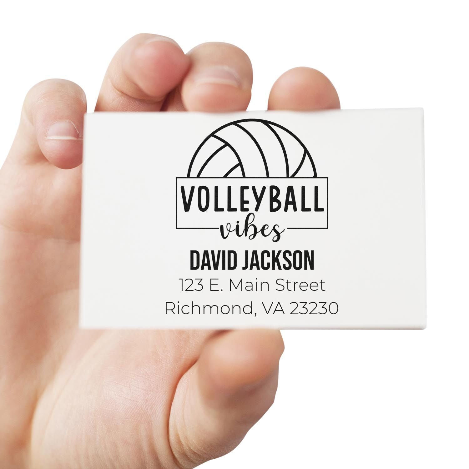Custom volleyball vibes rubber address stamp with name and Richmond, VA return address held in hand