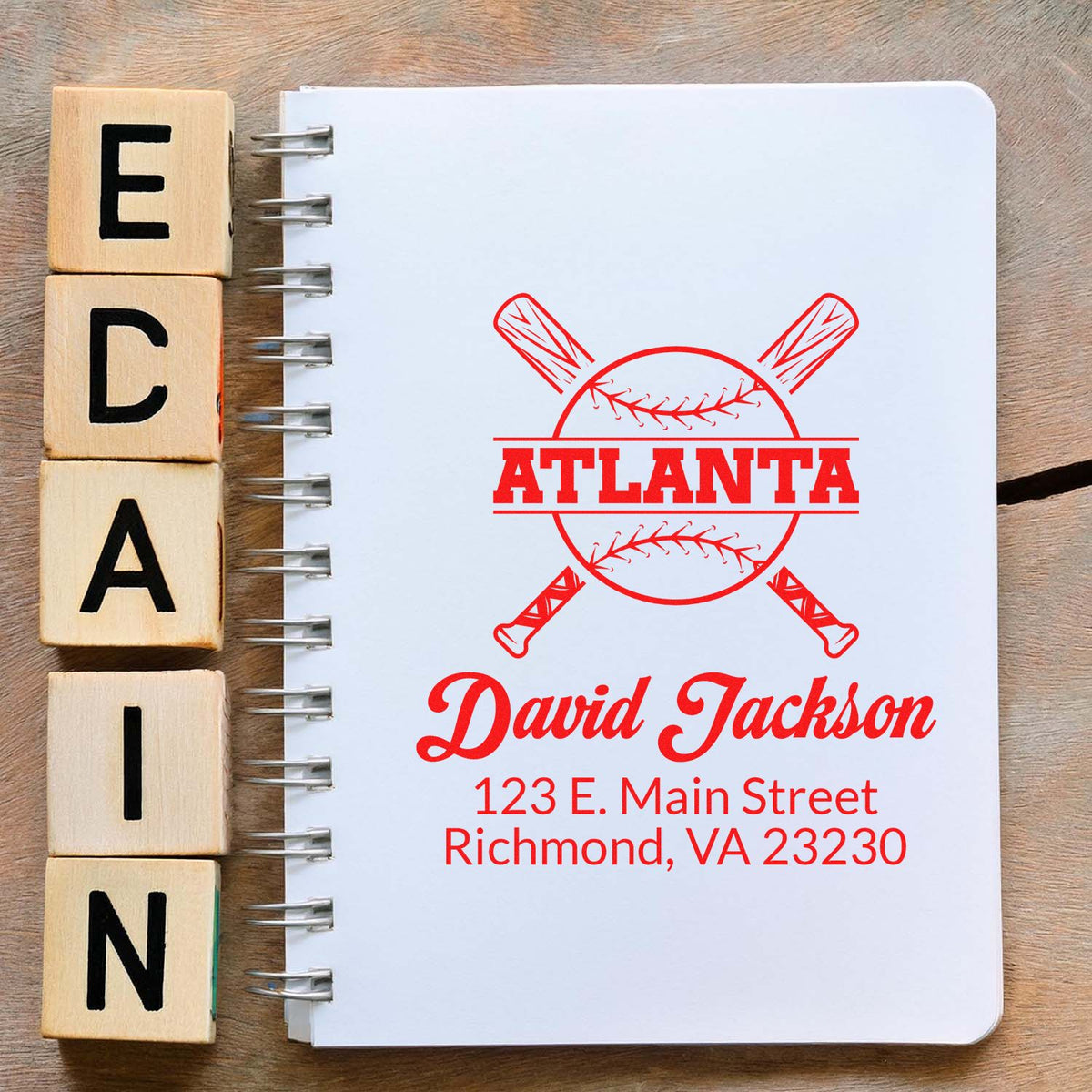 Custom baseball rubber stamp mockup with Atlanta logo, David Jackson name, and address for personalized stationery.