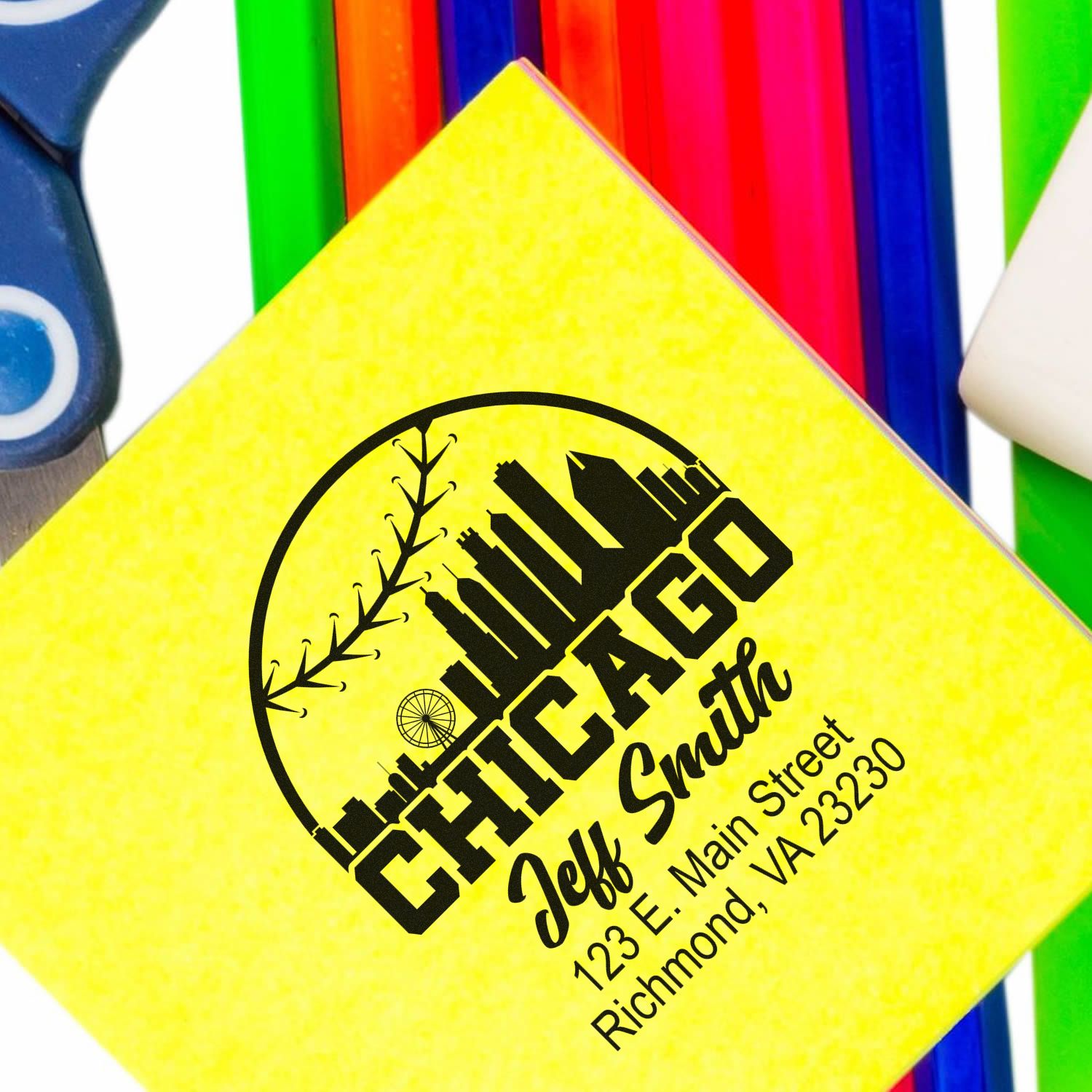 Personalized Chicago skyline return address rubber stamp for Jeff Smith on yellow paper.