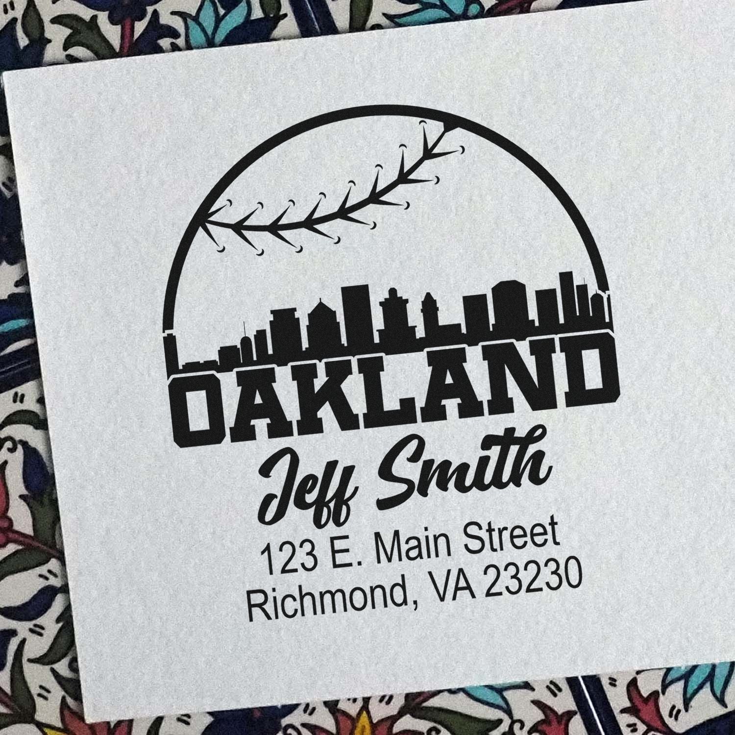 Oakland return address rubber stamp with skyline, branch motif, and Jeff Smith, 123 E. Main Street, Richmond, VA.