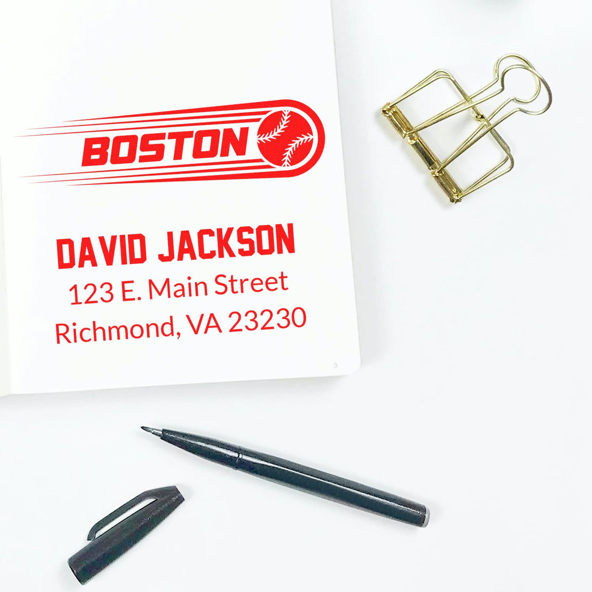 Custom rubber stamp with Boston baseball logo and return address for David Jackson, ideal for personalized mailing.