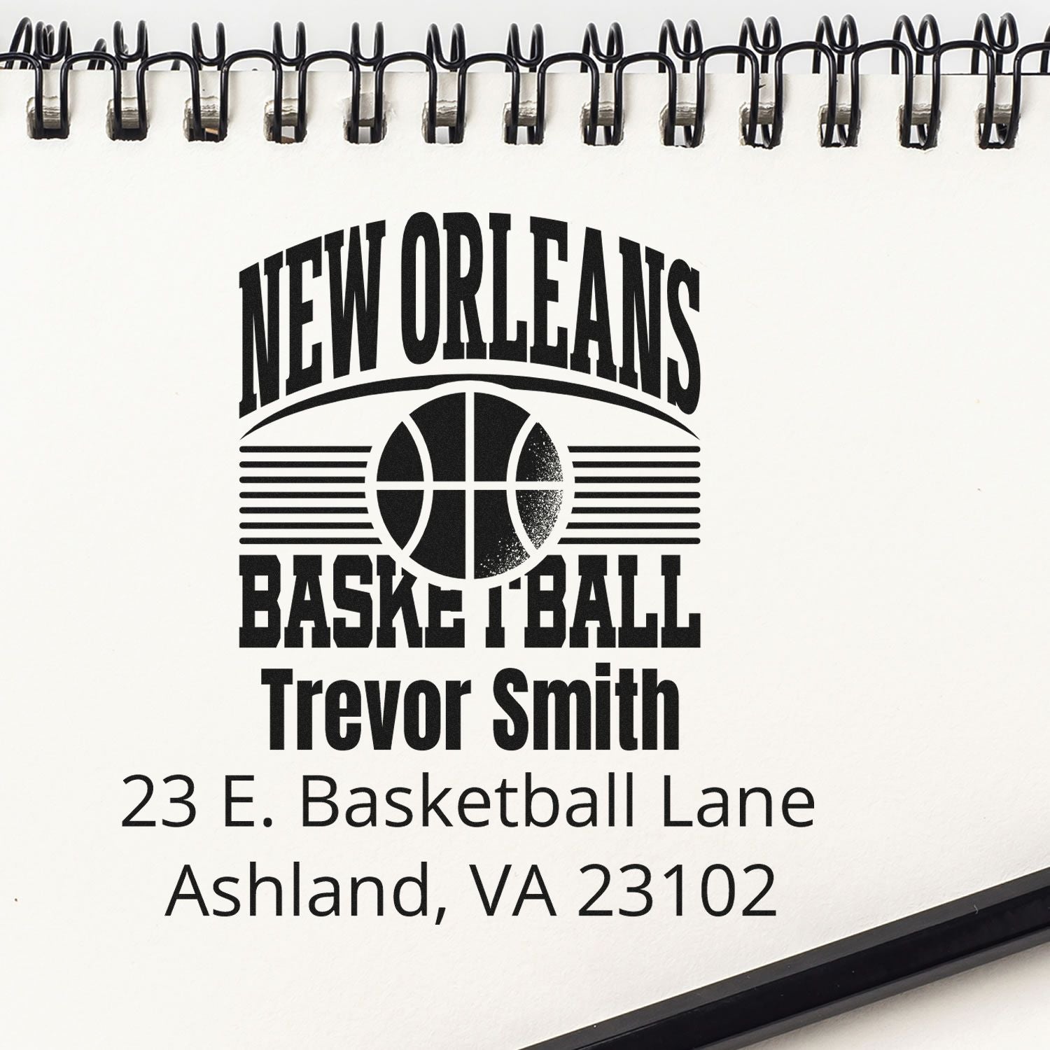 Custom New Orleans basketball address rubber stamp for Trevor Smith, featuring name, logo, and Ashland, VA address.