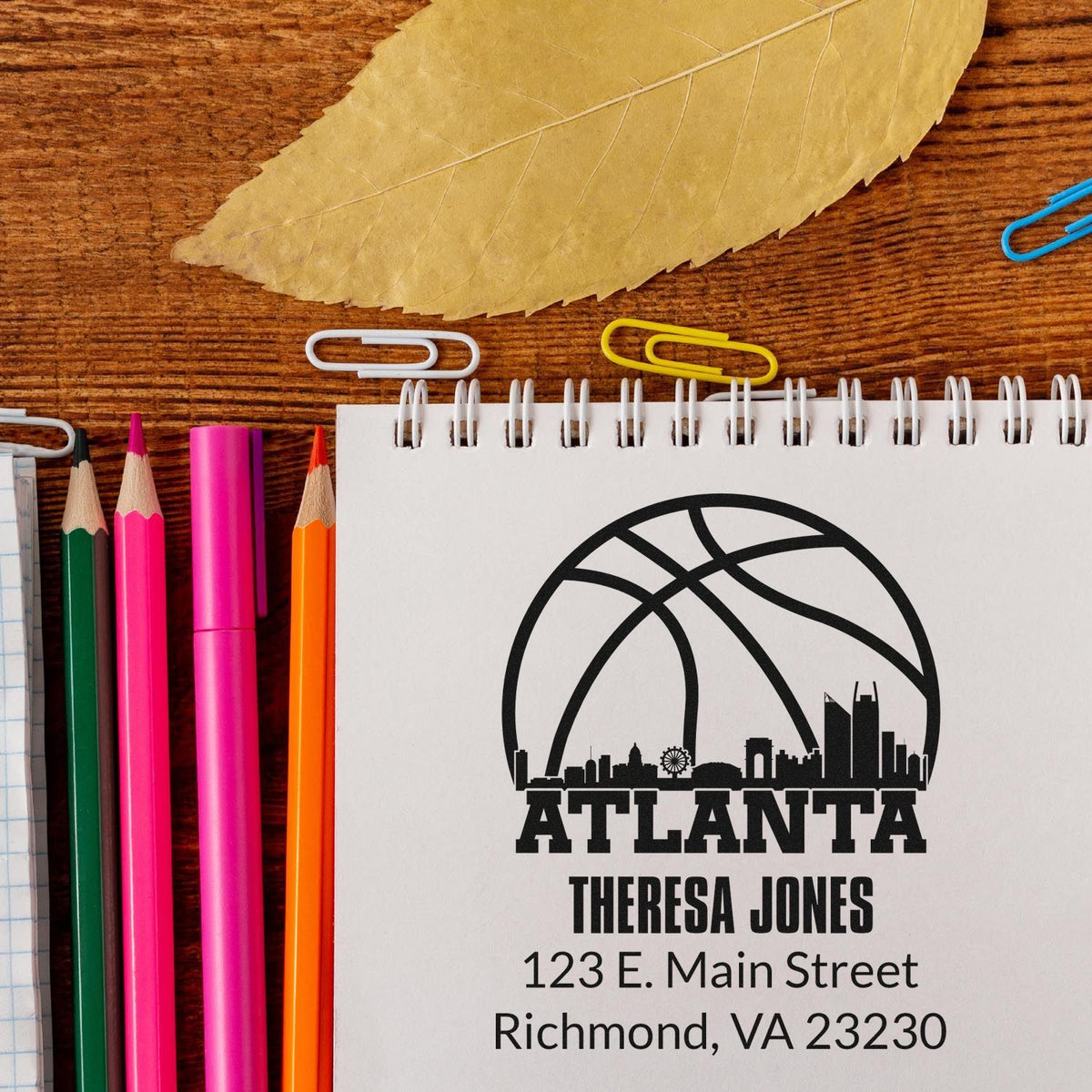 Personalized Atlanta rubber stamp design with name, address, and basketball skyline logo for Theresa Jones.