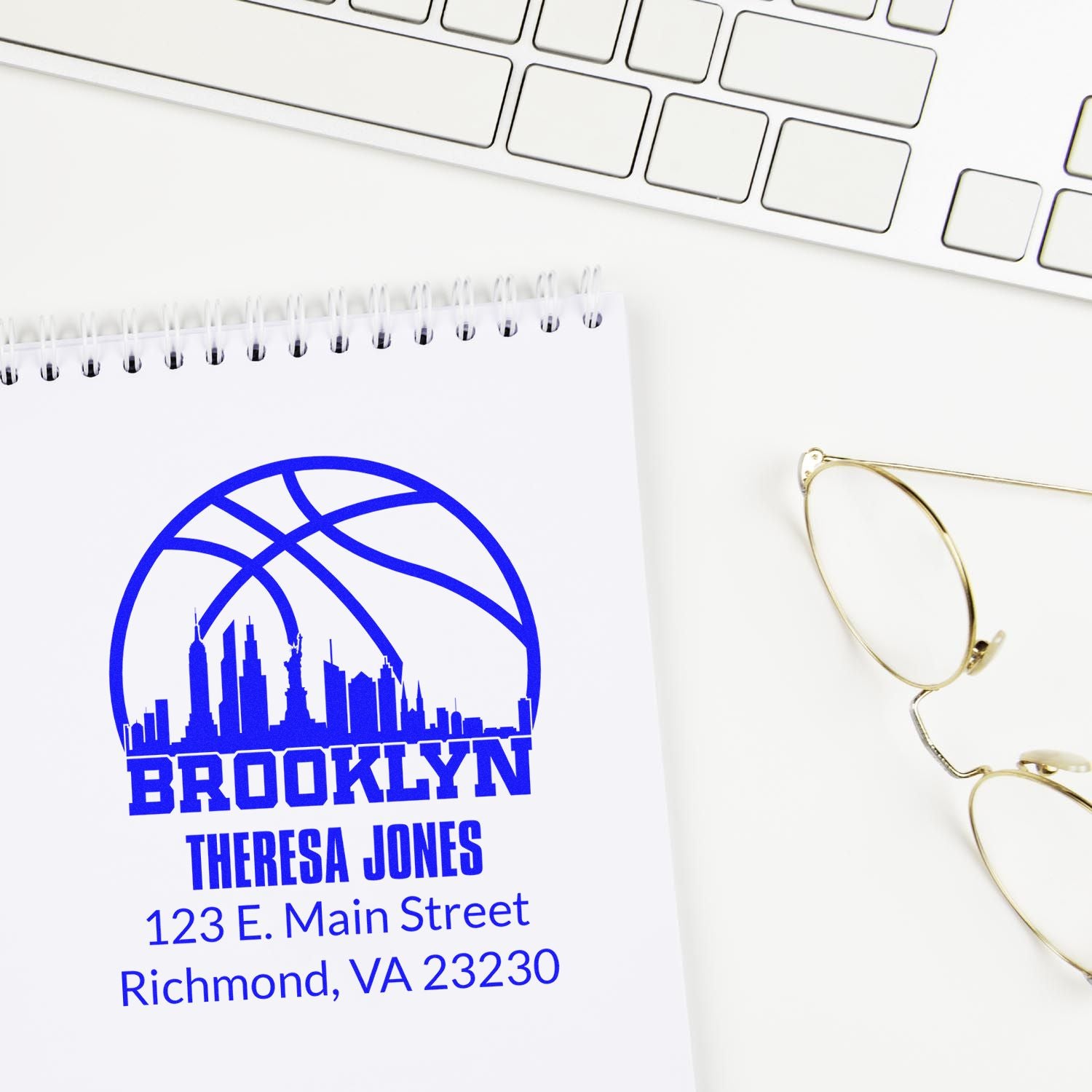 Custom Brooklyn address rubber stamp with skyline logo, name, and mailing address