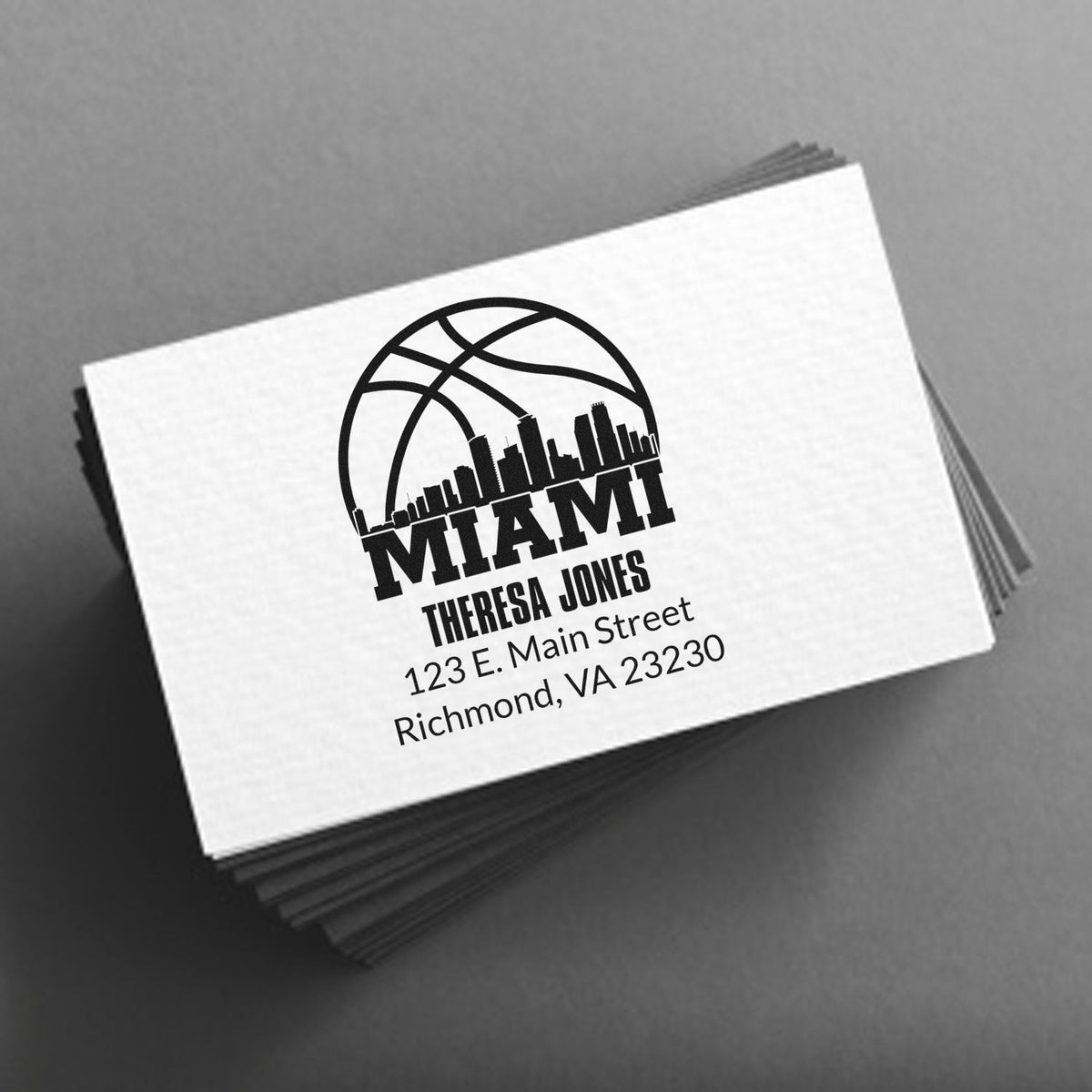 Custom Miami address stamp with logo, name, and Richmond, VA business details for professional mailings.