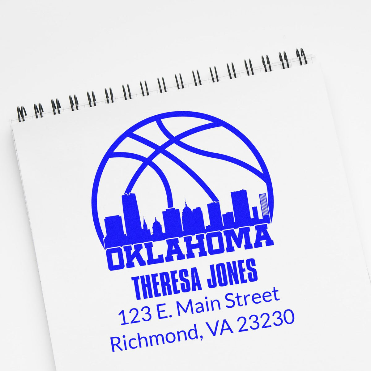 Custom Oklahoma address rubber stamp with skyline logo, Theresa Jones name, and Richmond return address.