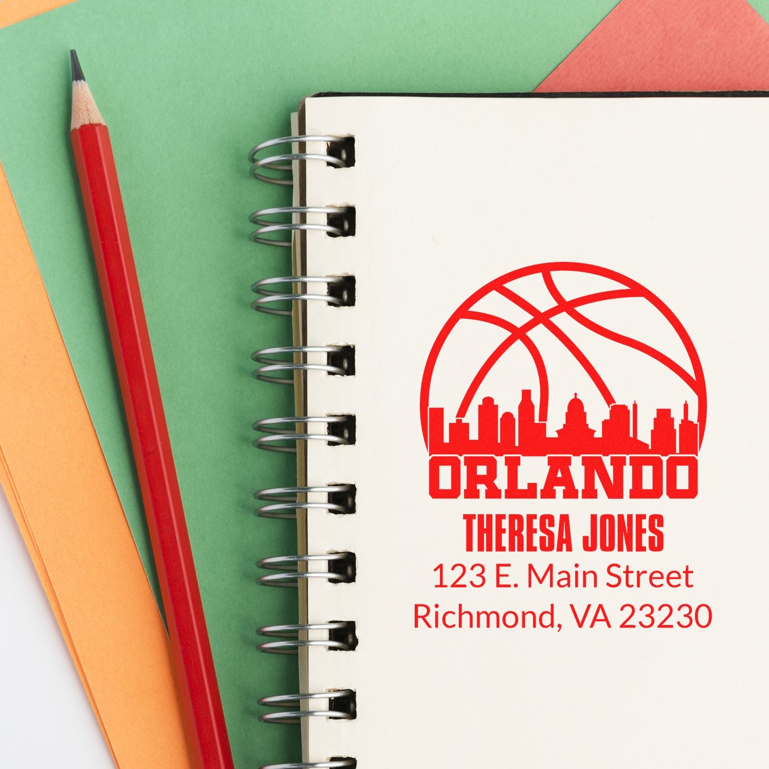 Custom Orlando return address rubber stamp for Theresa Jones, featuring a basketball skyline logo and mailing address.