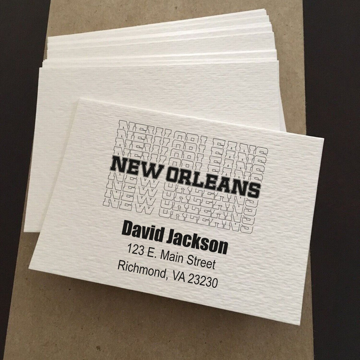 Custom rubber stamp sample for New Orleans branding with David Jackson address, Richmond, VA.