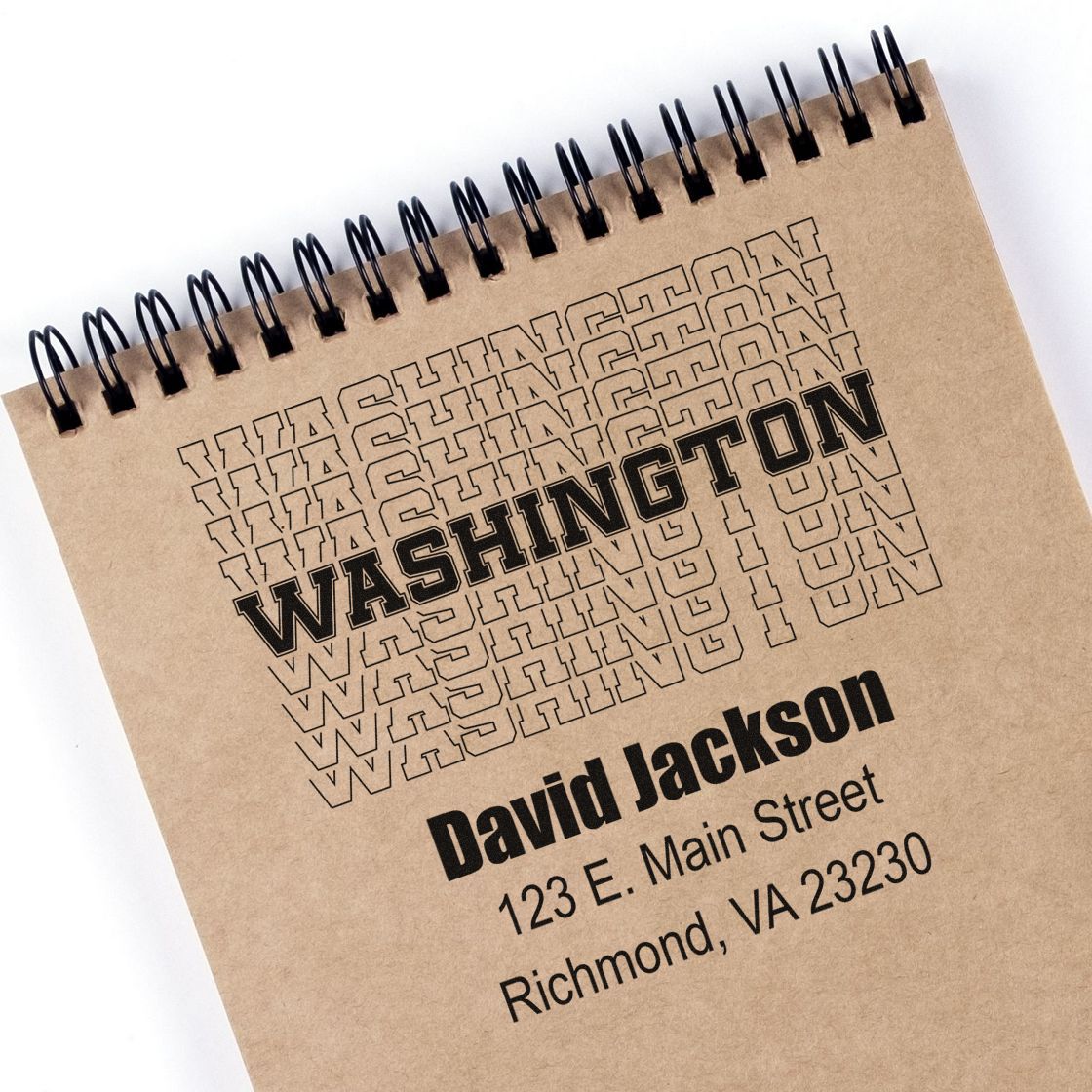 Custom rubber stamp design on kraft notebook featuring Washington text, David Jackson, and Richmond, VA address.