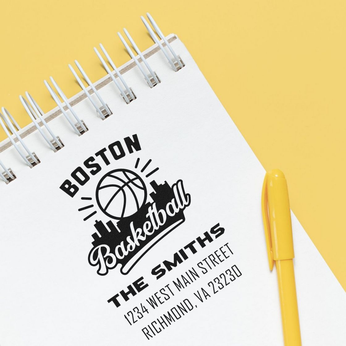 Custom address rubber stamp on notebook featuring Boston Basketball logo and The Smiths return address.
