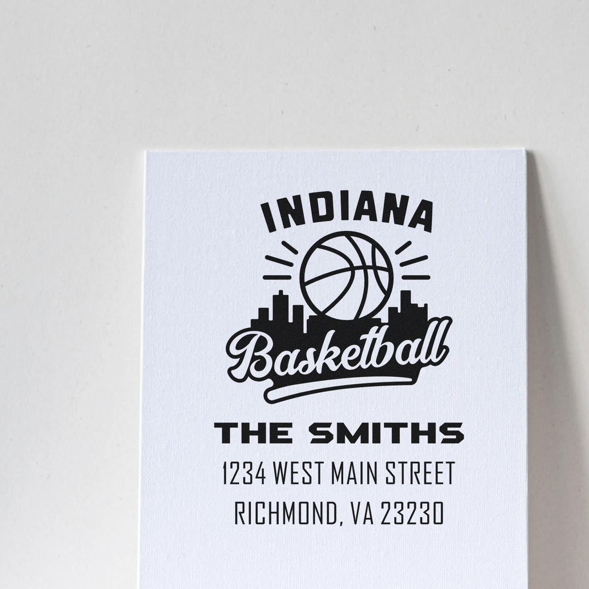Custom Indiana basketball return address stamp for The Smiths with city skyline and full mailing address.