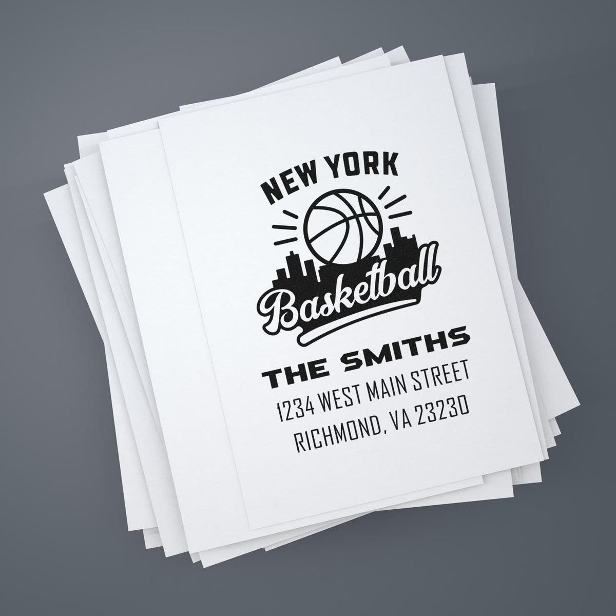 Custom rubber address stamp for The Smiths, featuring a New York basketball design on stacked paper.