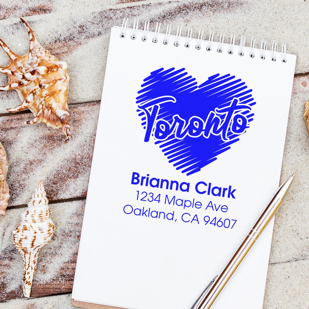 Custom Toronto heart return address rubber stamp for Brianna Clark, Oakland, CA 94607.